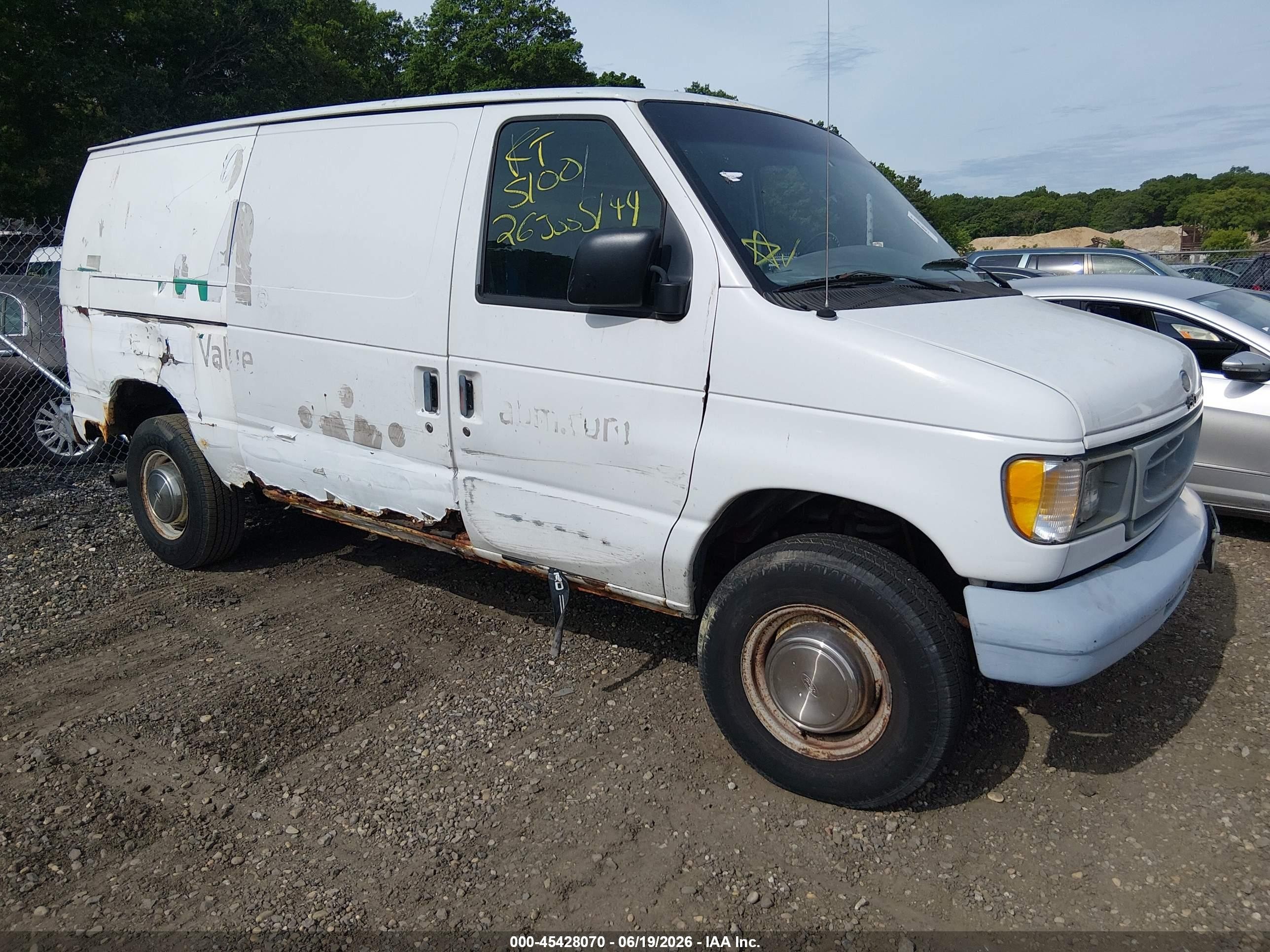 1999 Ford Econoline Cargo, VIN 1FTSE34L9XHC02847 — Side