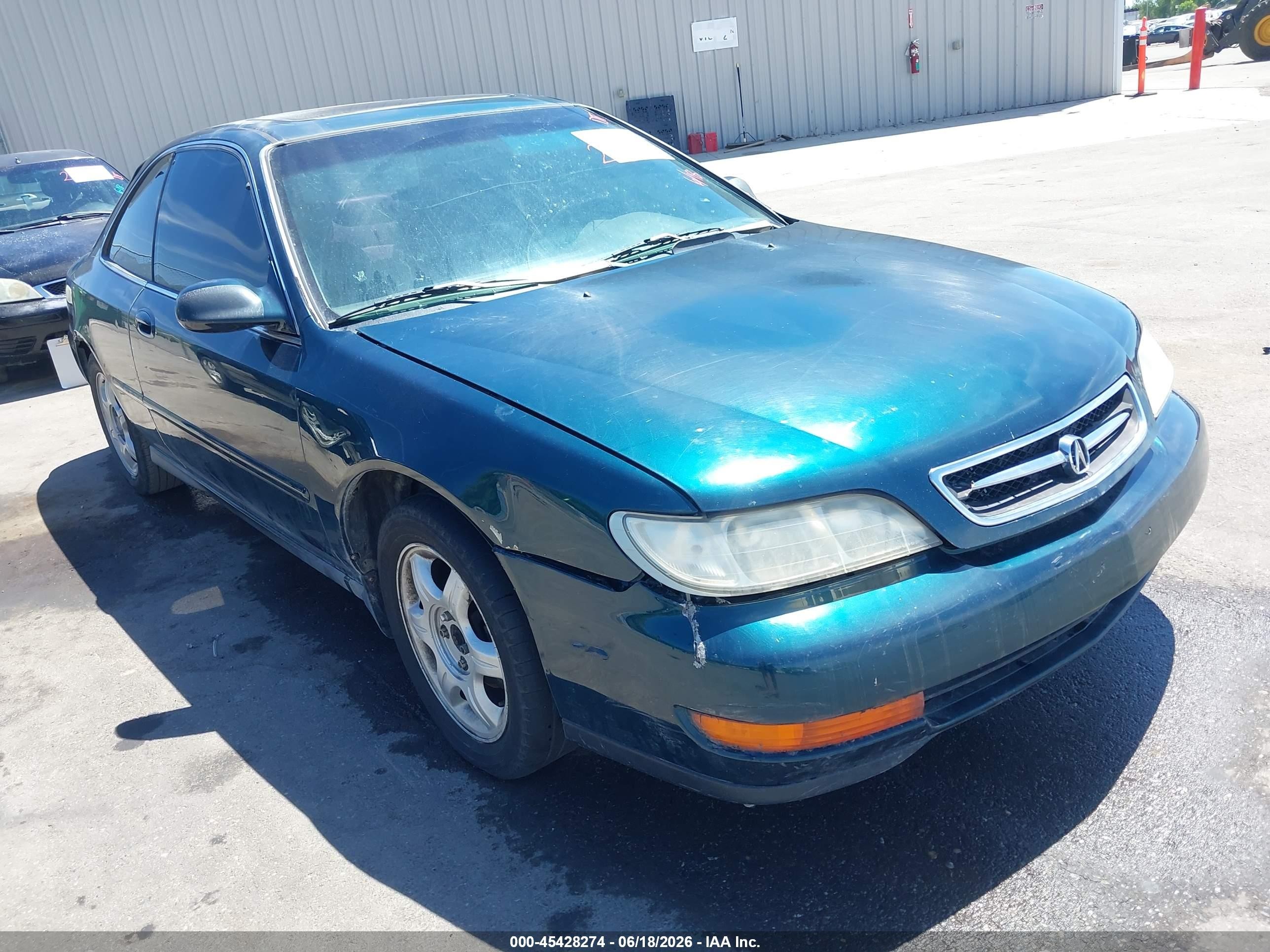 1997 Acura CL Premium, VIN 19UYA125XVL016423 — Side