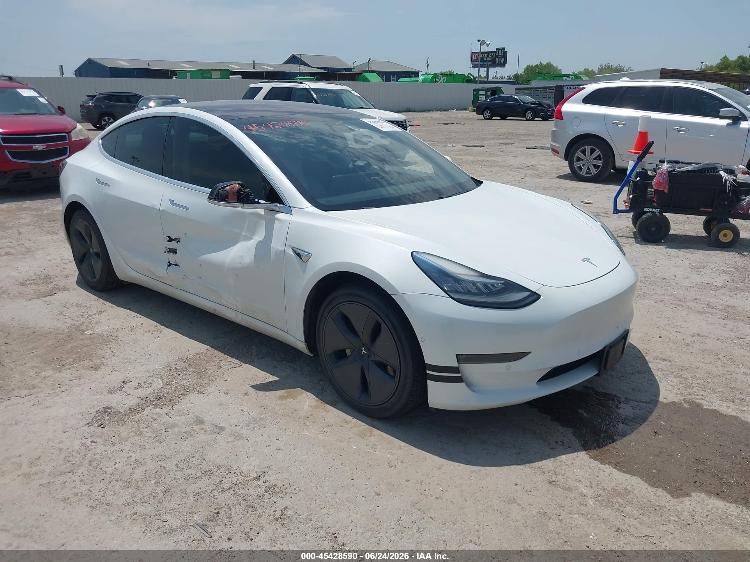 2018 Tesla Model 3 Long Range Battery, VIN 5YJ3E1EA1JF057722 — Side