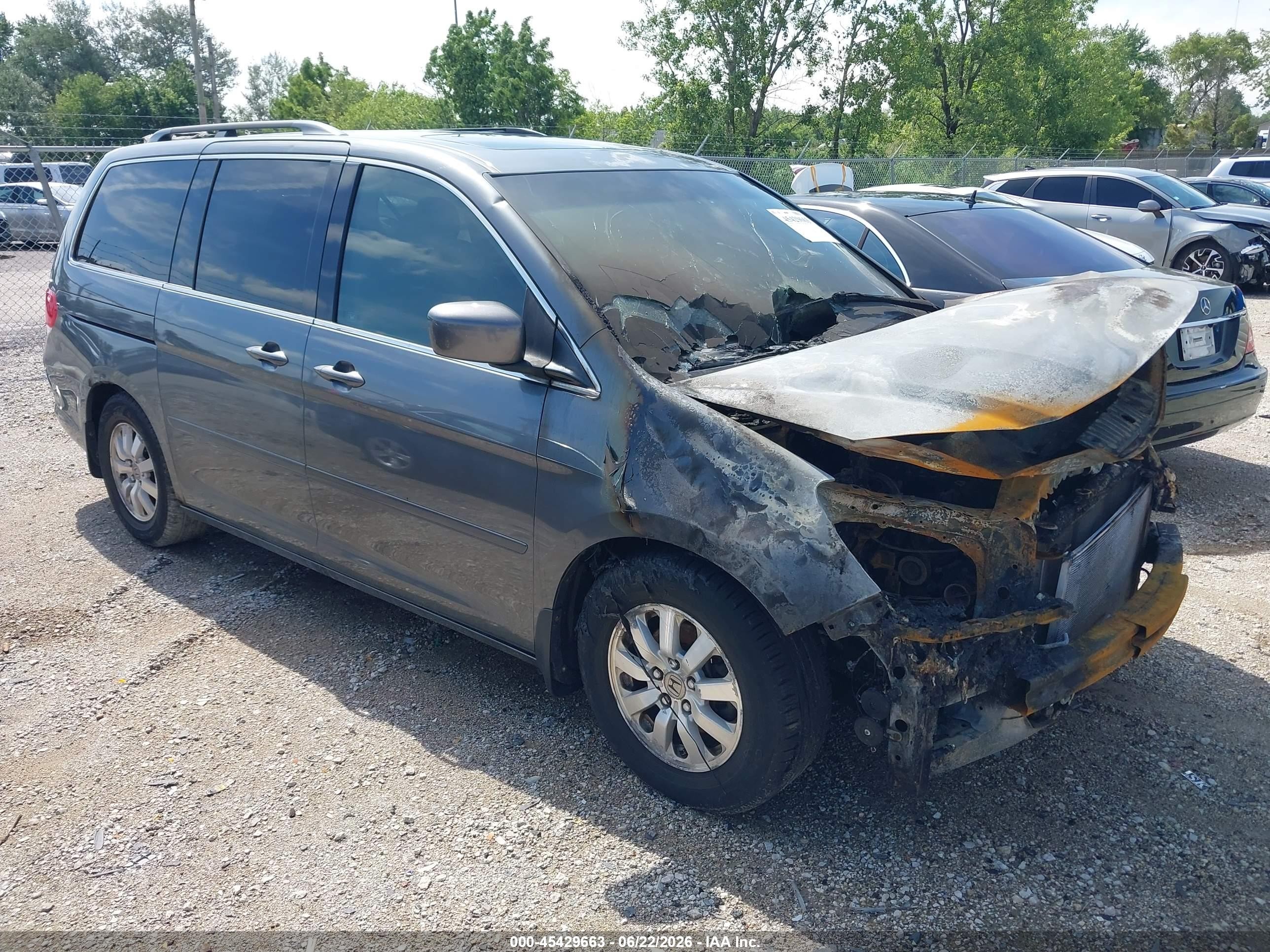 2010 Honda Odyssey EX-L, VIN 5FNRL3H77AB113612 — Engine fire