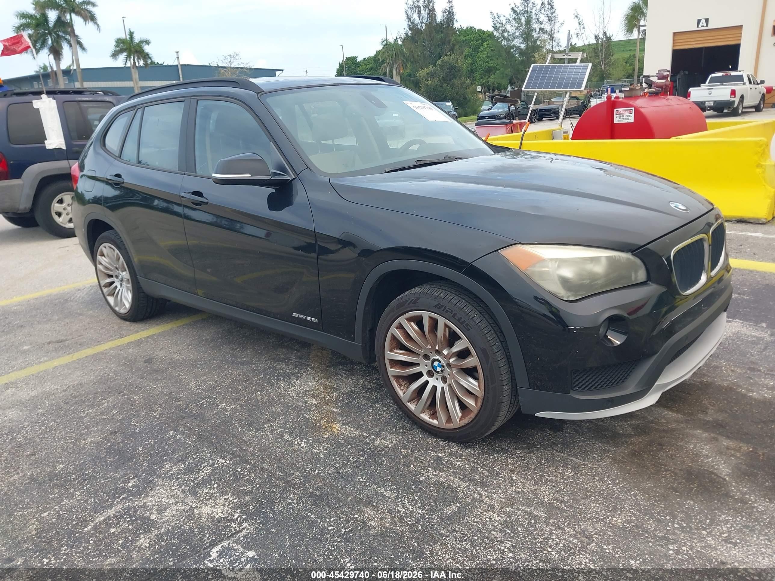 2015 BMW X1 sDrive28i, VIN WBAVM1C55FVZ94273 — Hail
