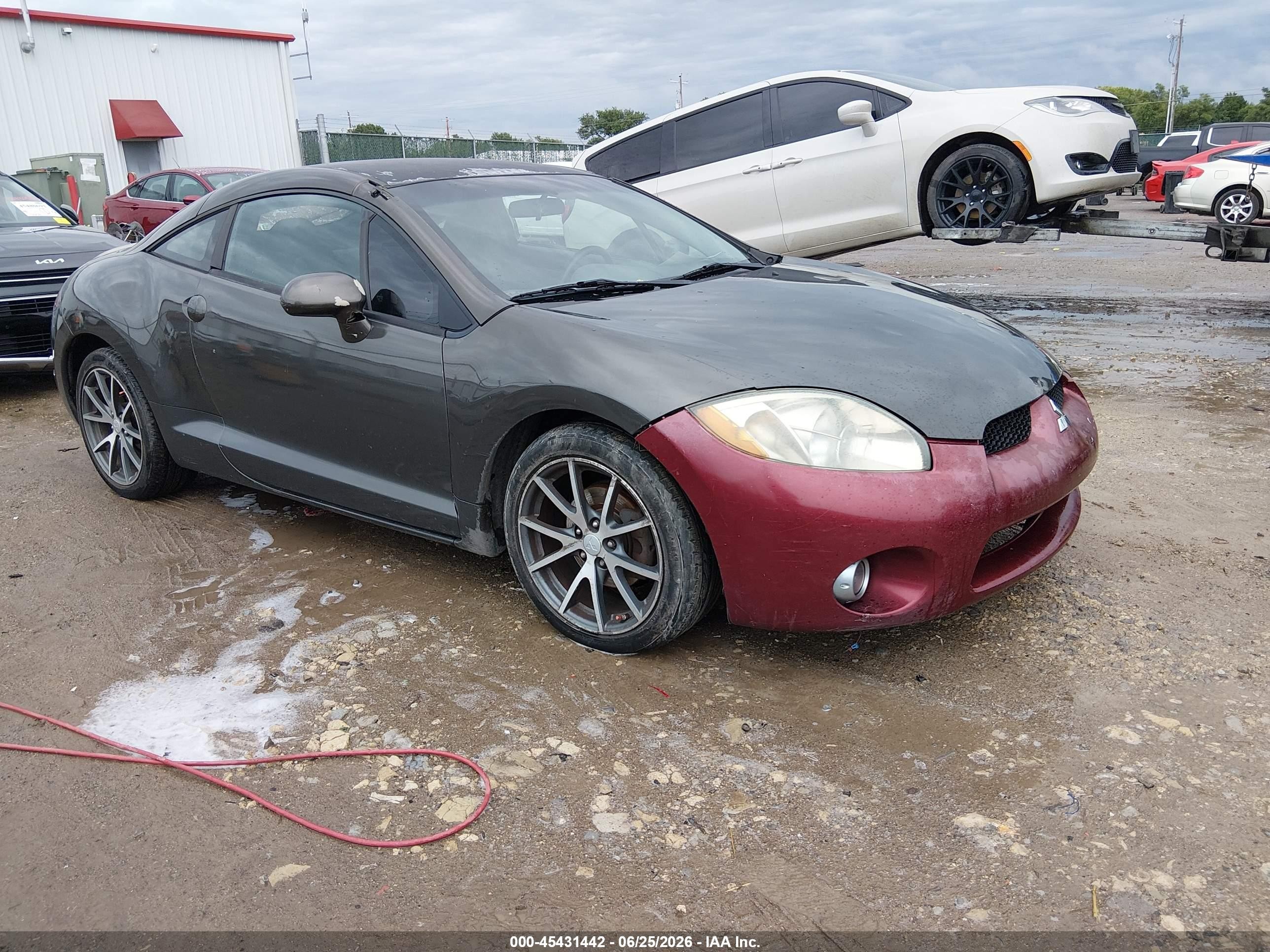 2011 Mitsubishi Eclipse GS, VIN 4A31K5DF7BE017133 — Side