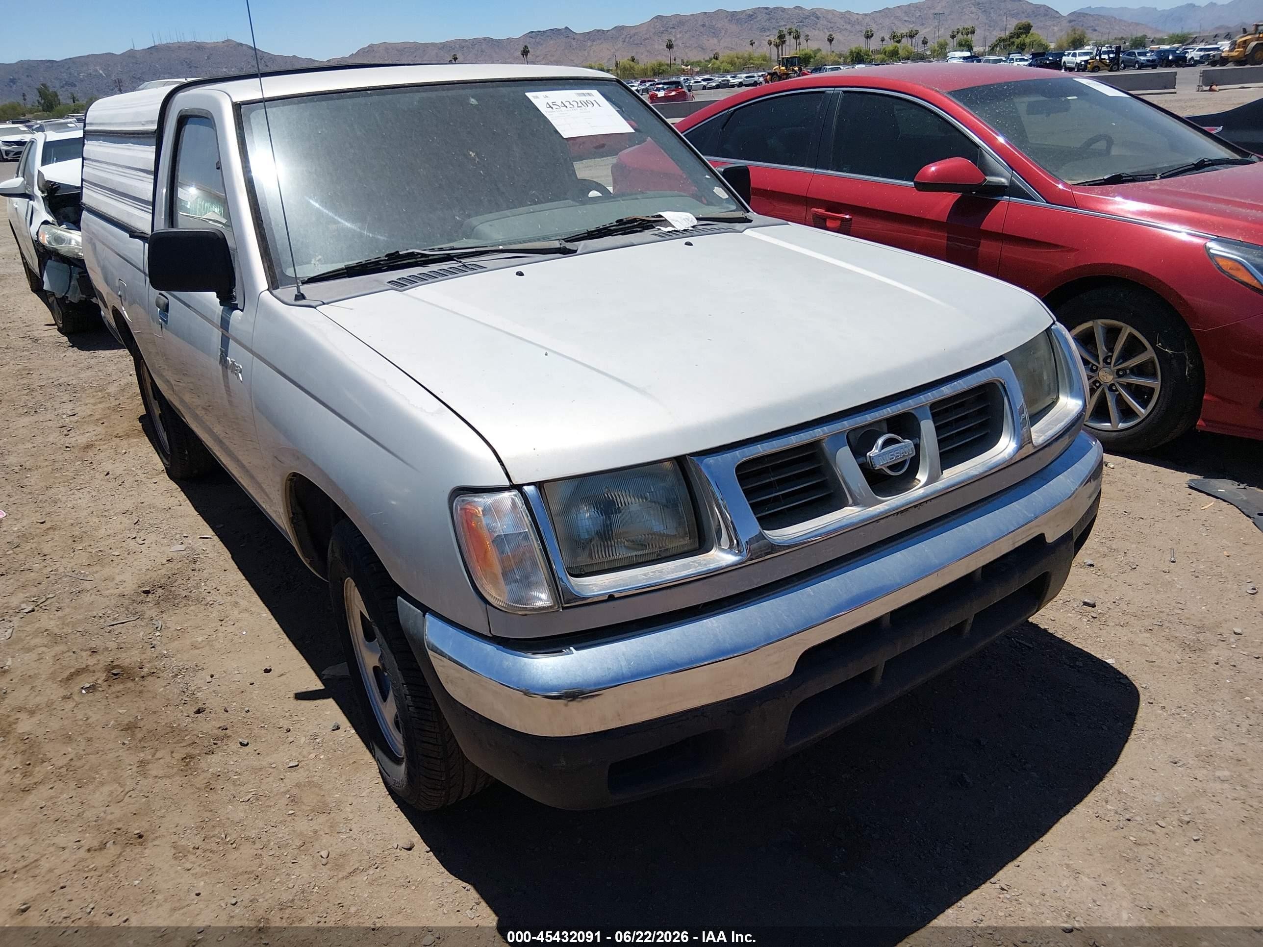 1999 Nissan Frontier XE, VIN 1N6DD21S2XC330570 — Normal wear