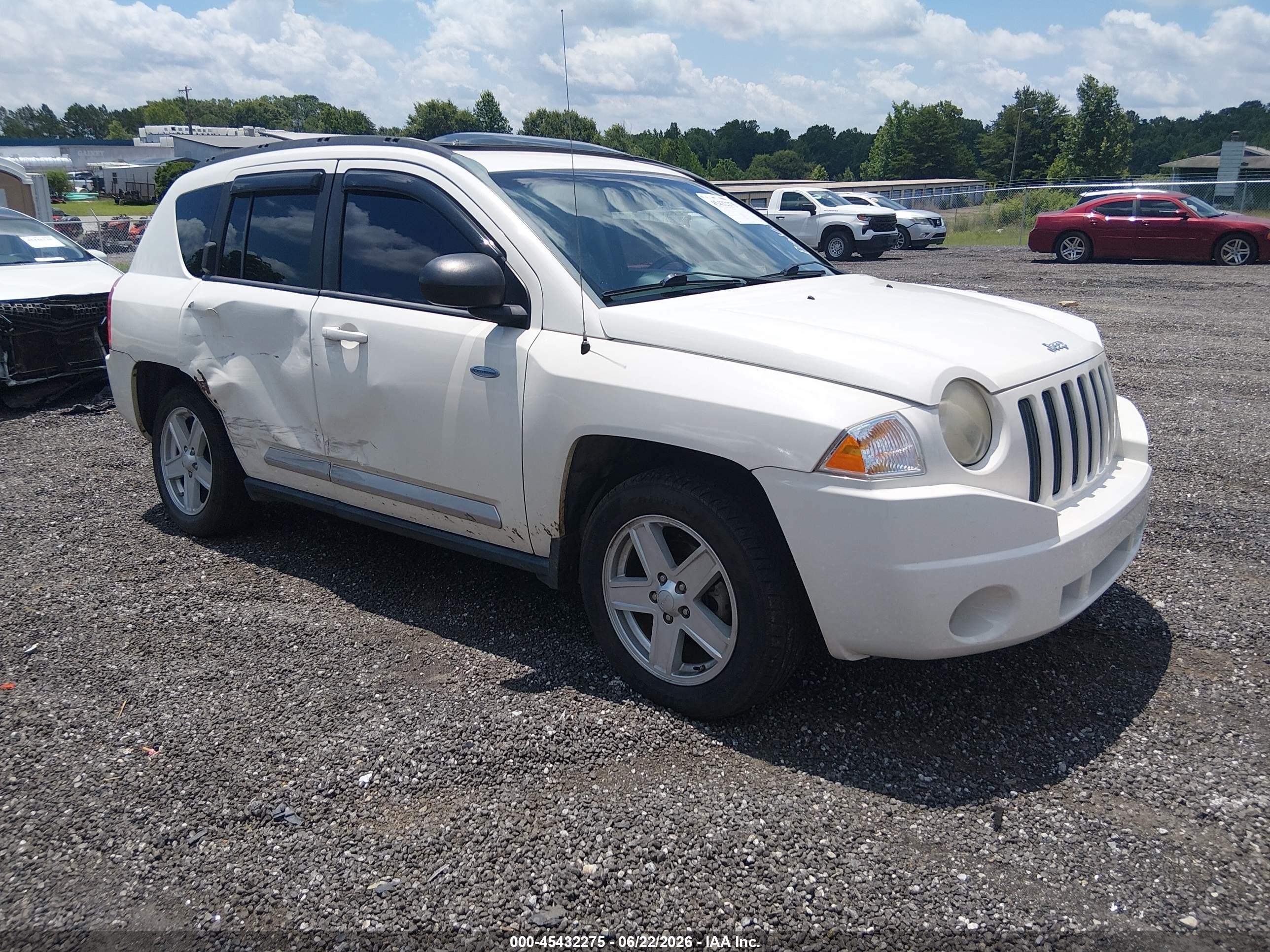 2010 Jeep Compass Sport, VIN 1J4NT1FB4AD626375 — Side