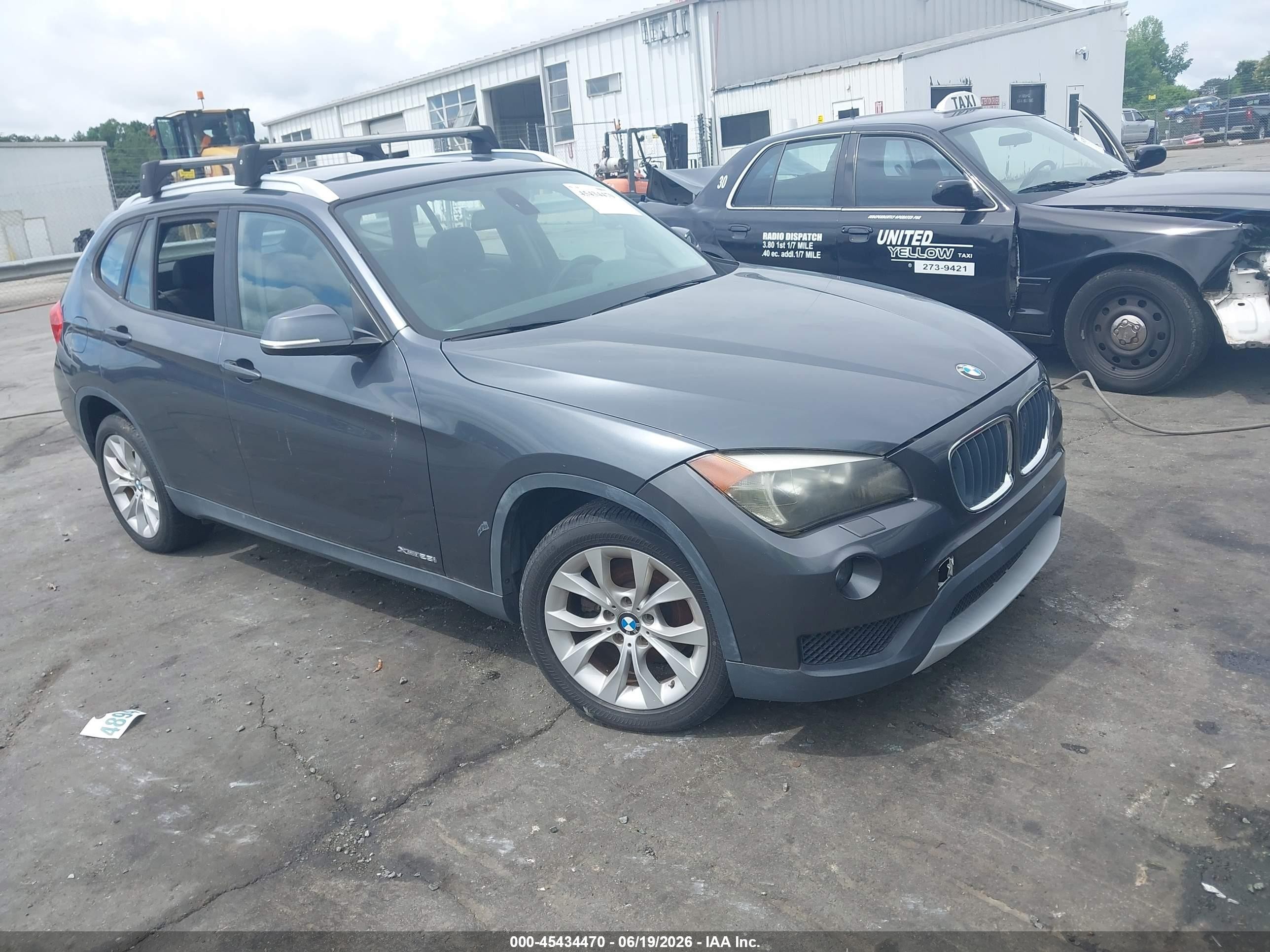 2014 BMW X1 xDrive28i, VIN WBAVL1C53EVY19294 — Repossession