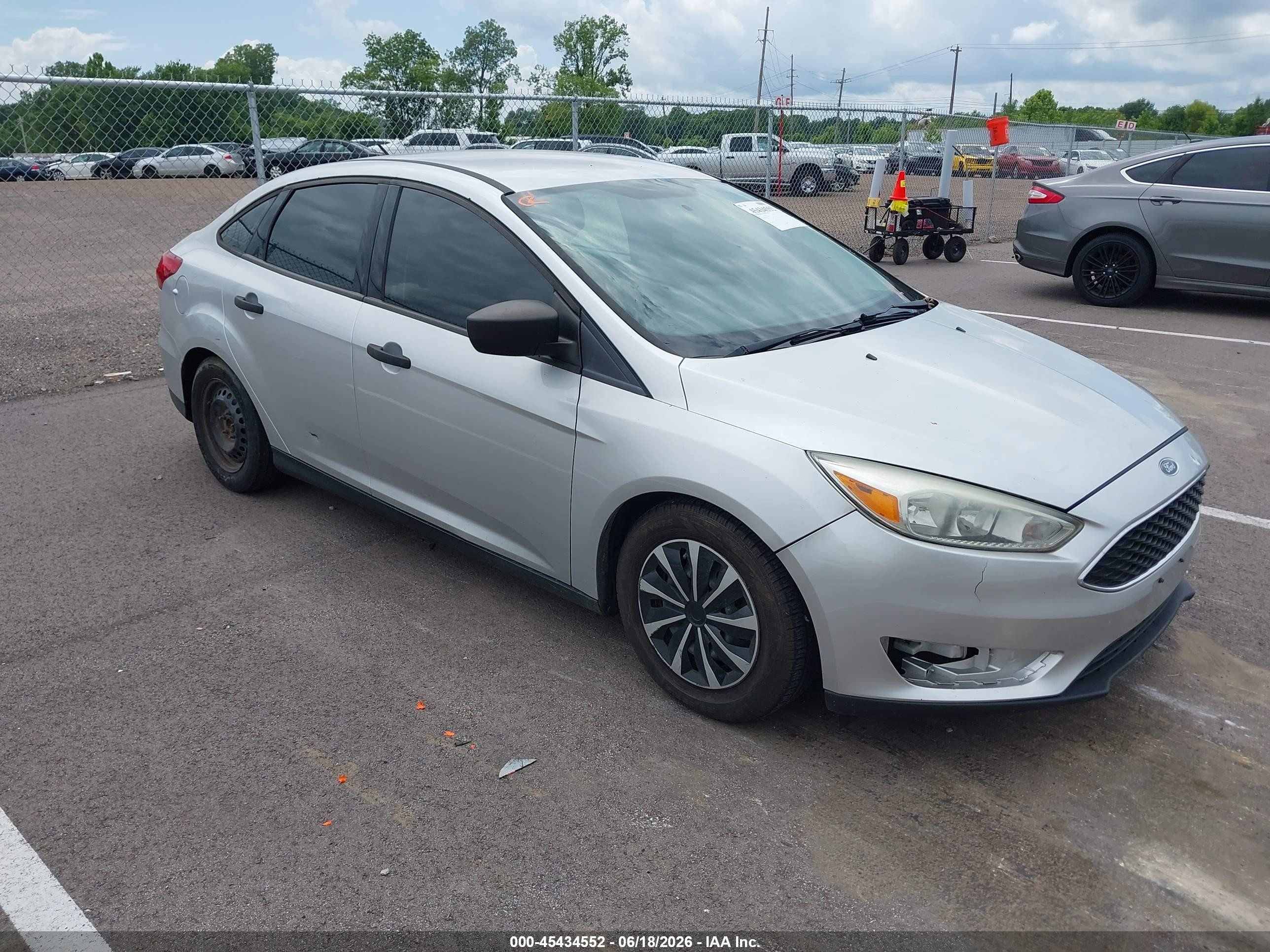 2015 Ford Focus S, VIN 1FADP3E29FL219707 — Not stated
