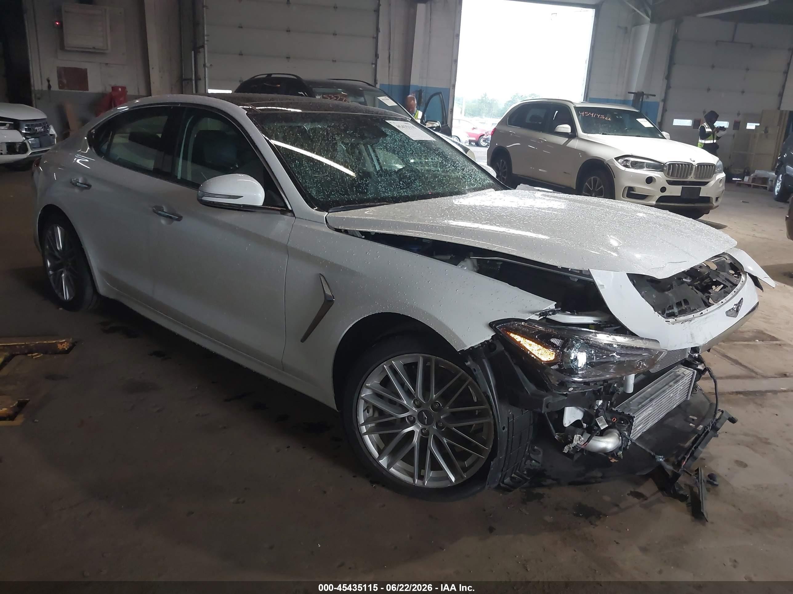 2021 Genesis G70 2.0T, VIN KMTG34LA9MU069464 — Front end