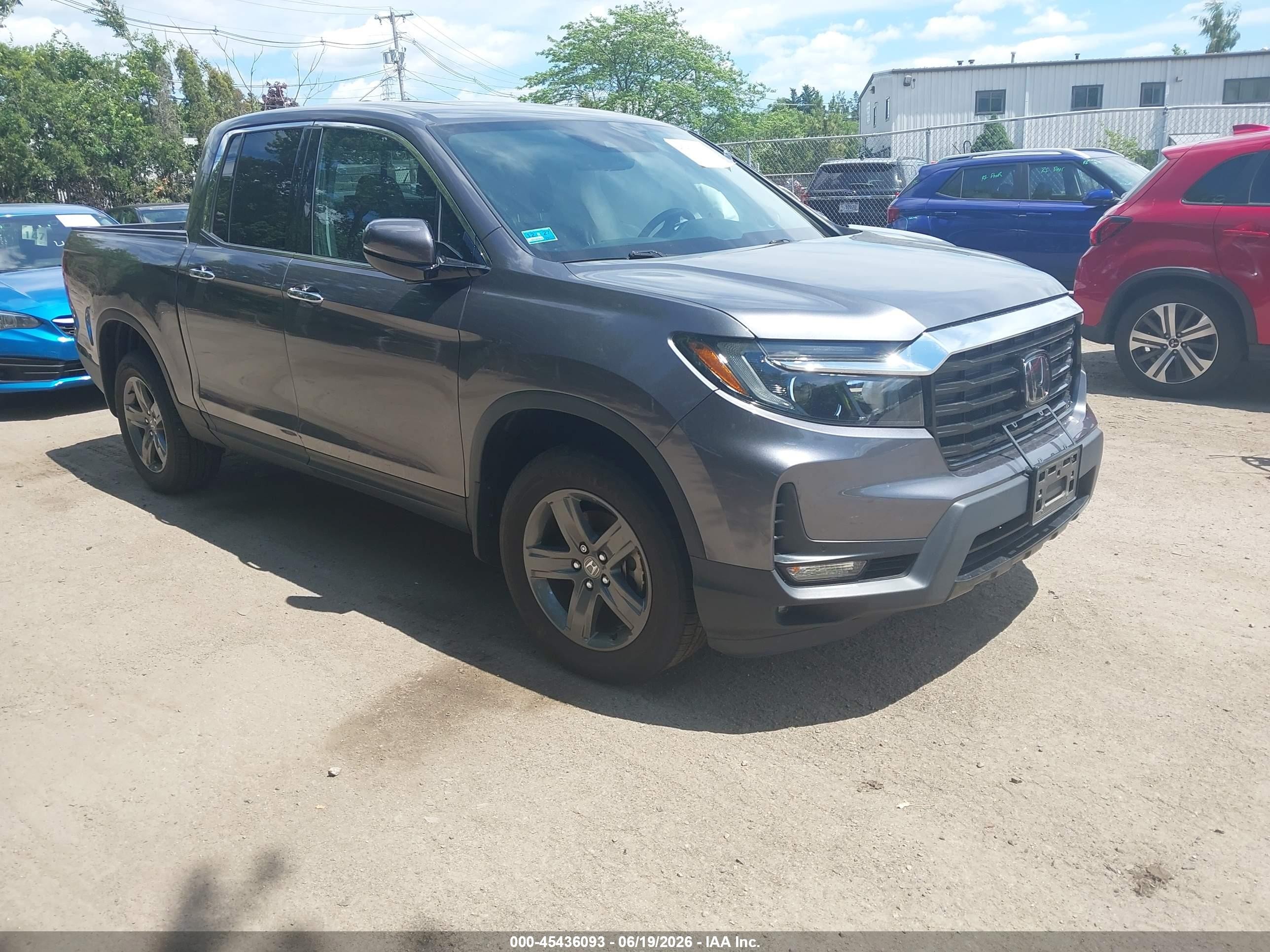 2021 Honda Ridgeline RTL-E, VIN 5FPYK3F79MB026453 — Side