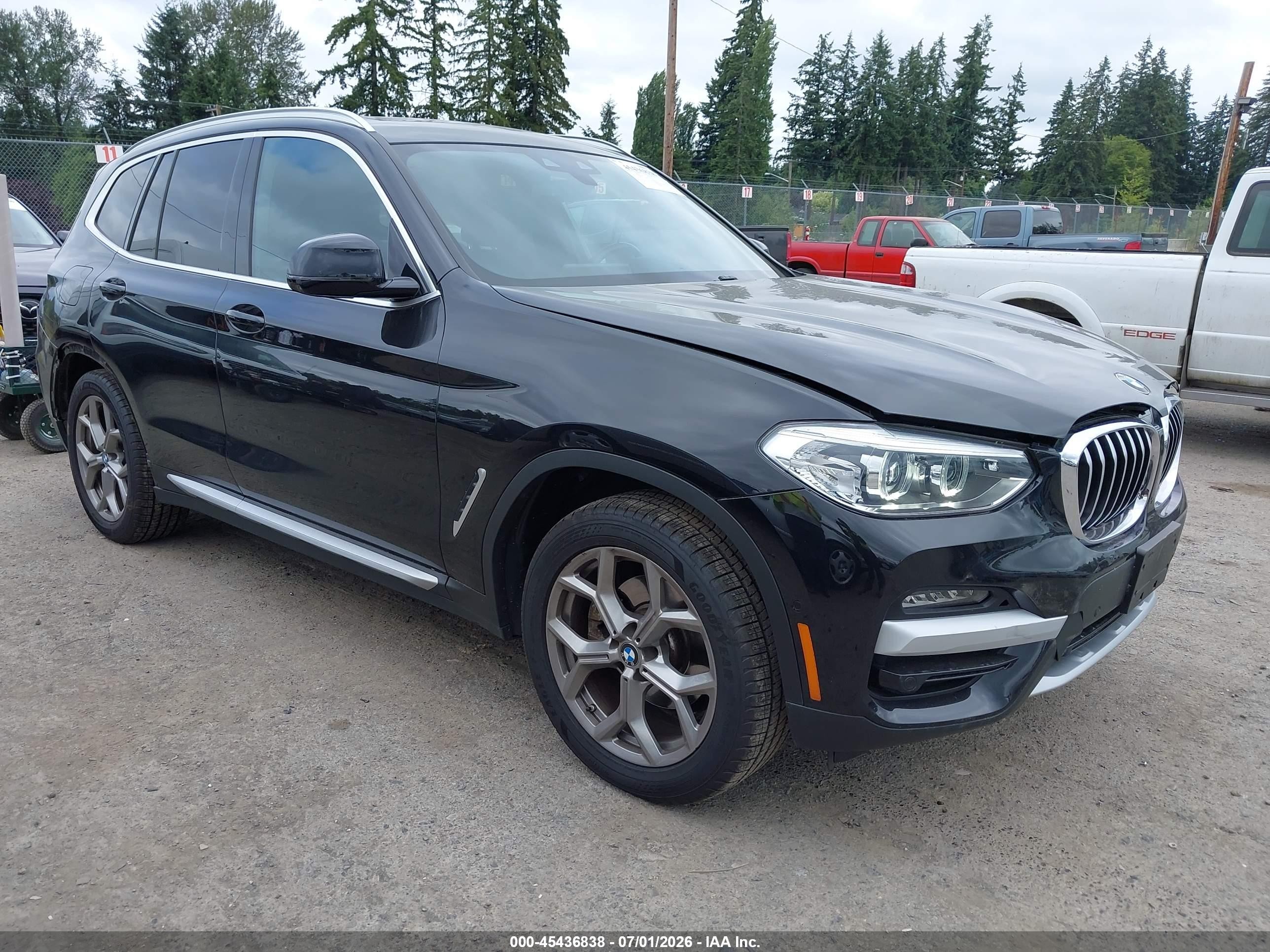 2021 BMW X3 xDrive30e, VIN 5UXTS1C04M9H06772 — Rear end