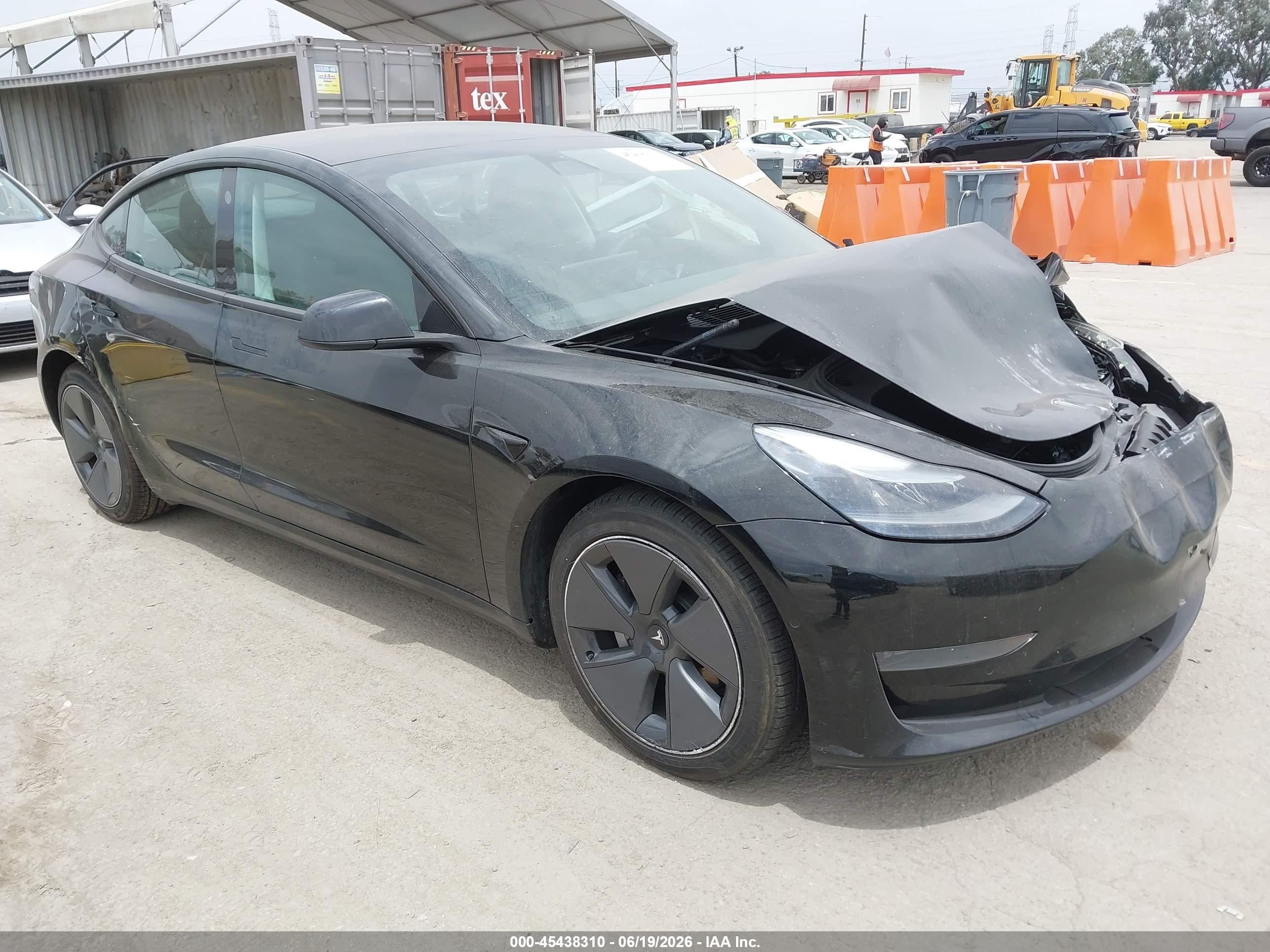 2021 Tesla Model 3 Standard Range Plus, VIN 5YJ3E1EA1MF074976 — Front end