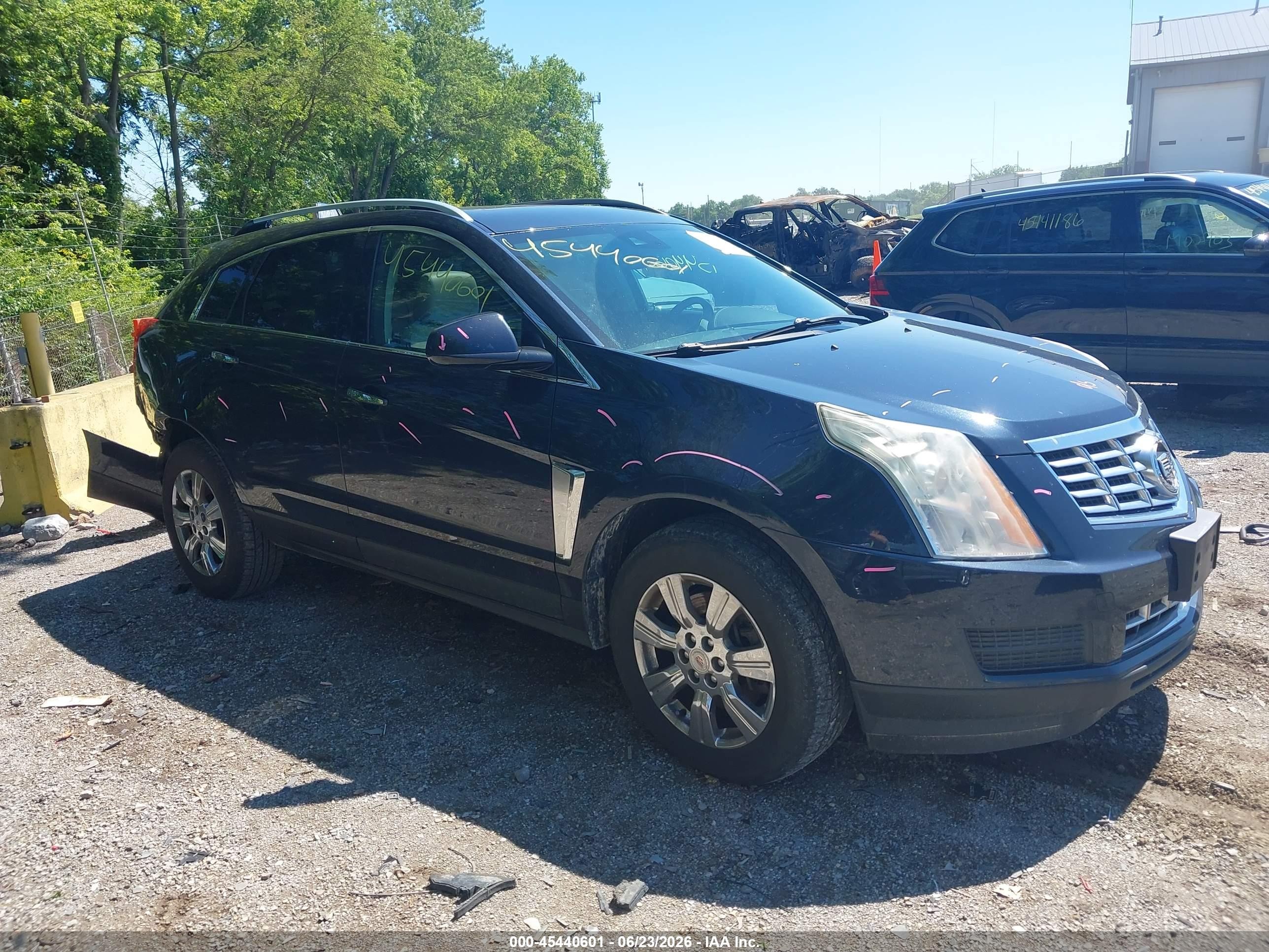 2014 Cadillac SRX Luxury Collection, VIN 3GYFNBE31ES674663 — Зад