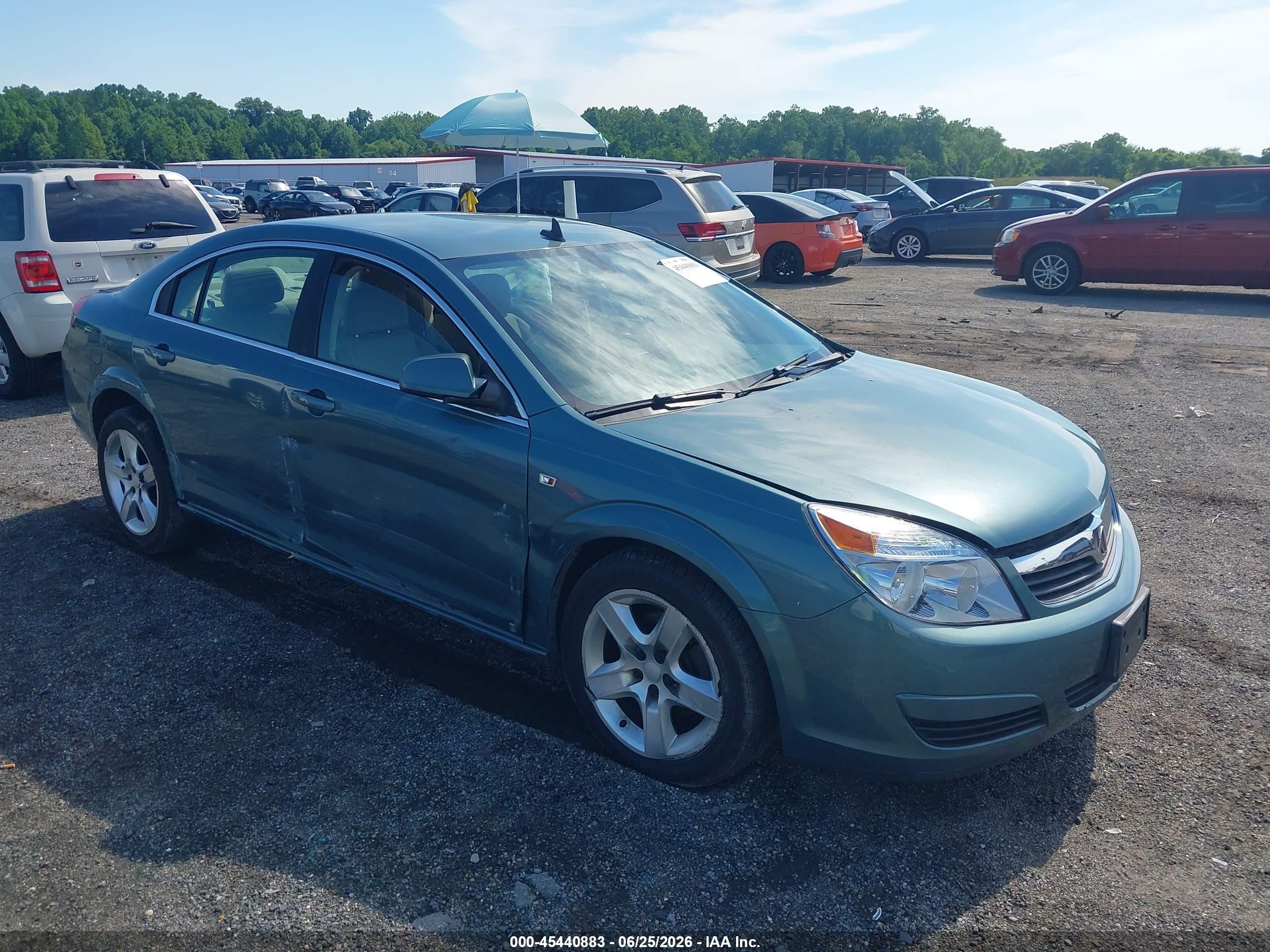 2009 Saturn Aura XE, VIN 1G8ZS57B89F156474 — Бок