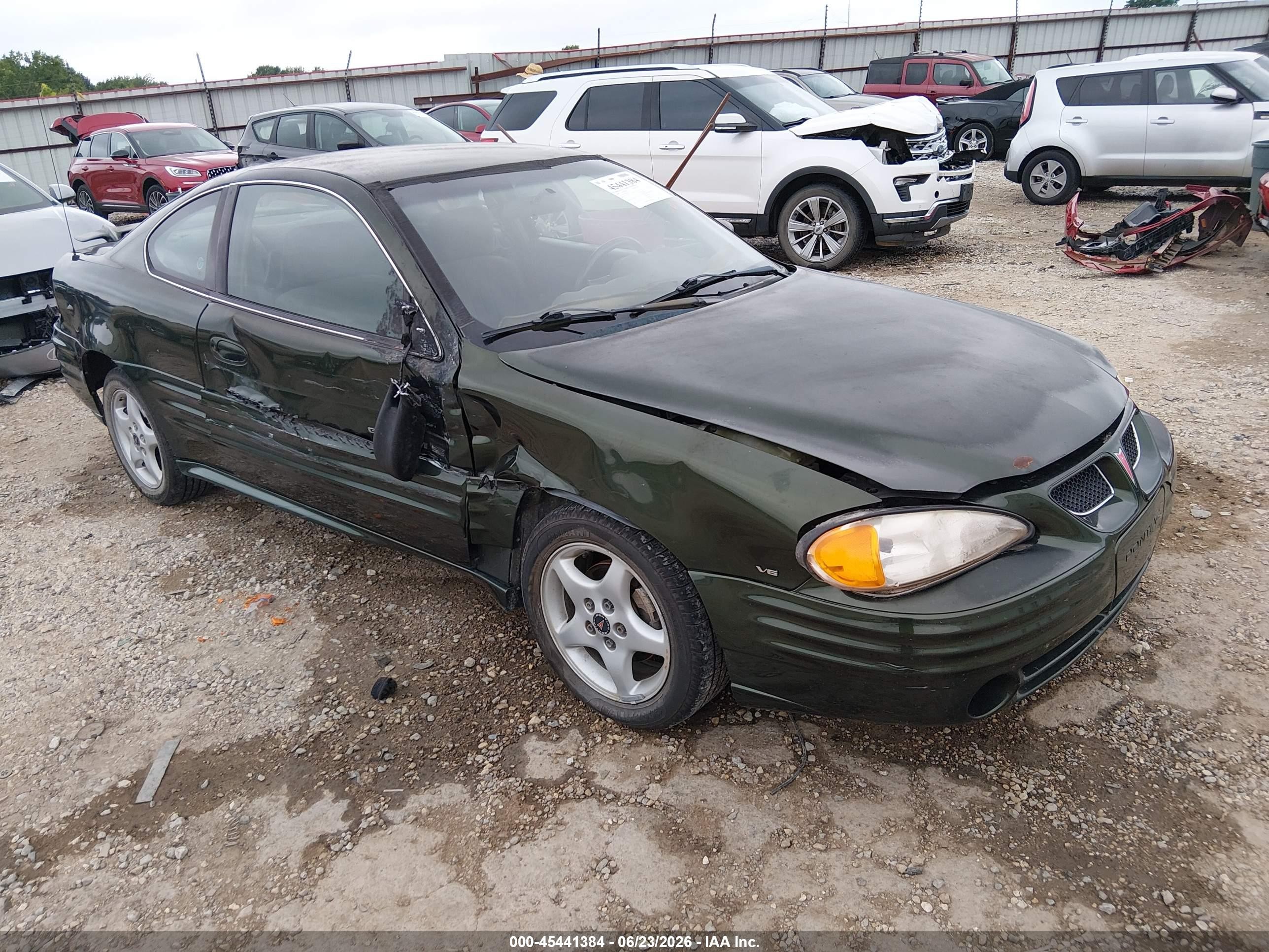 2000 Pontiac Grand Am, VIN 1G2NF12EXYM715279 — Side