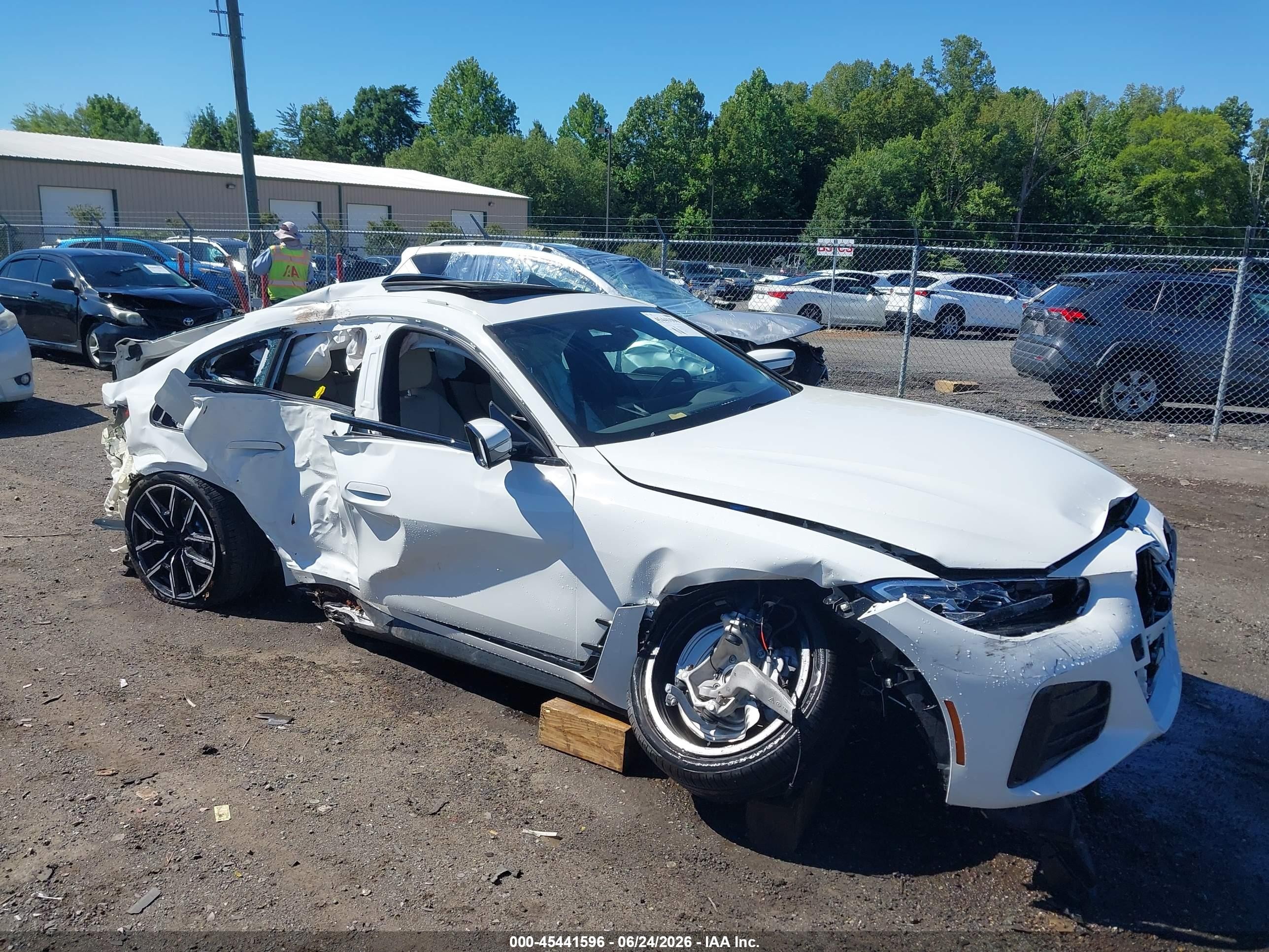2024 BMW i4 eDrive35, VIN WBY43AW03RFR69659 — Side