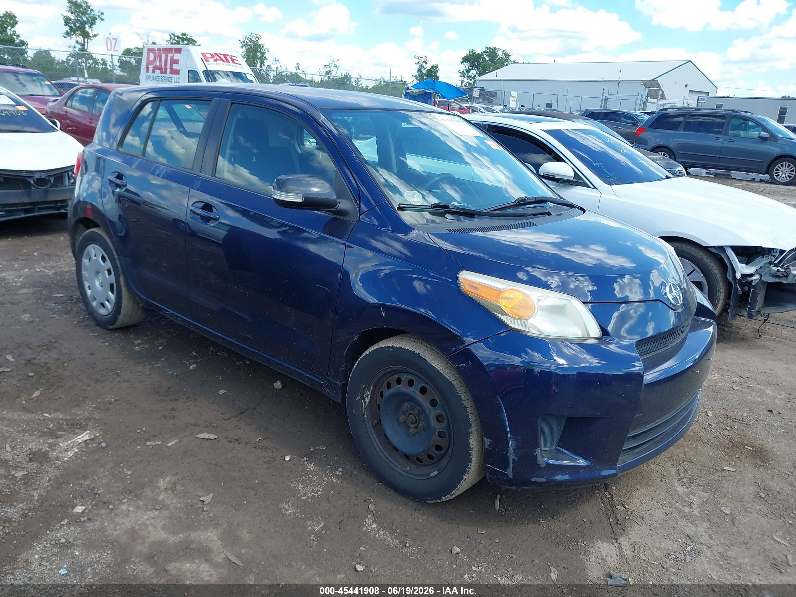 2010 Scion xD, VIN JTKKU4B48AJ058625 — Side