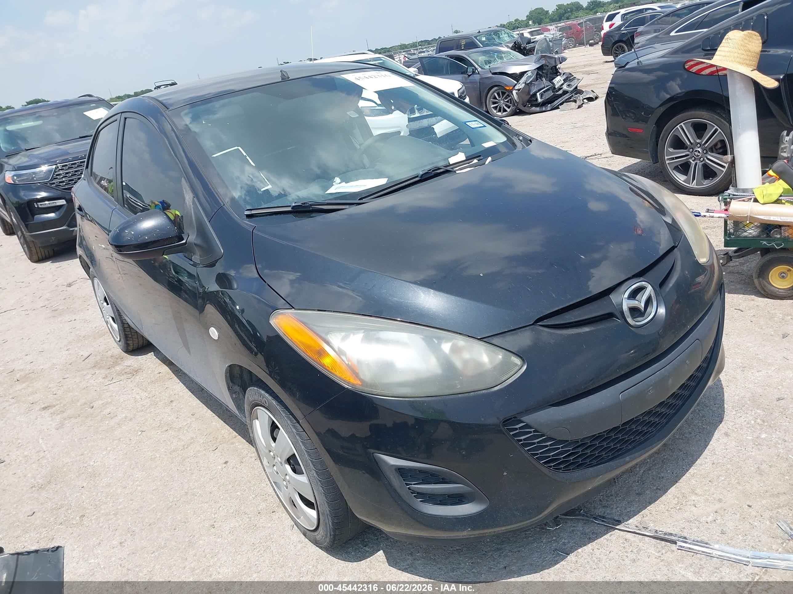 2013 Mazda 2 Sport, VIN JM1DE1KYXD0170240 — Side