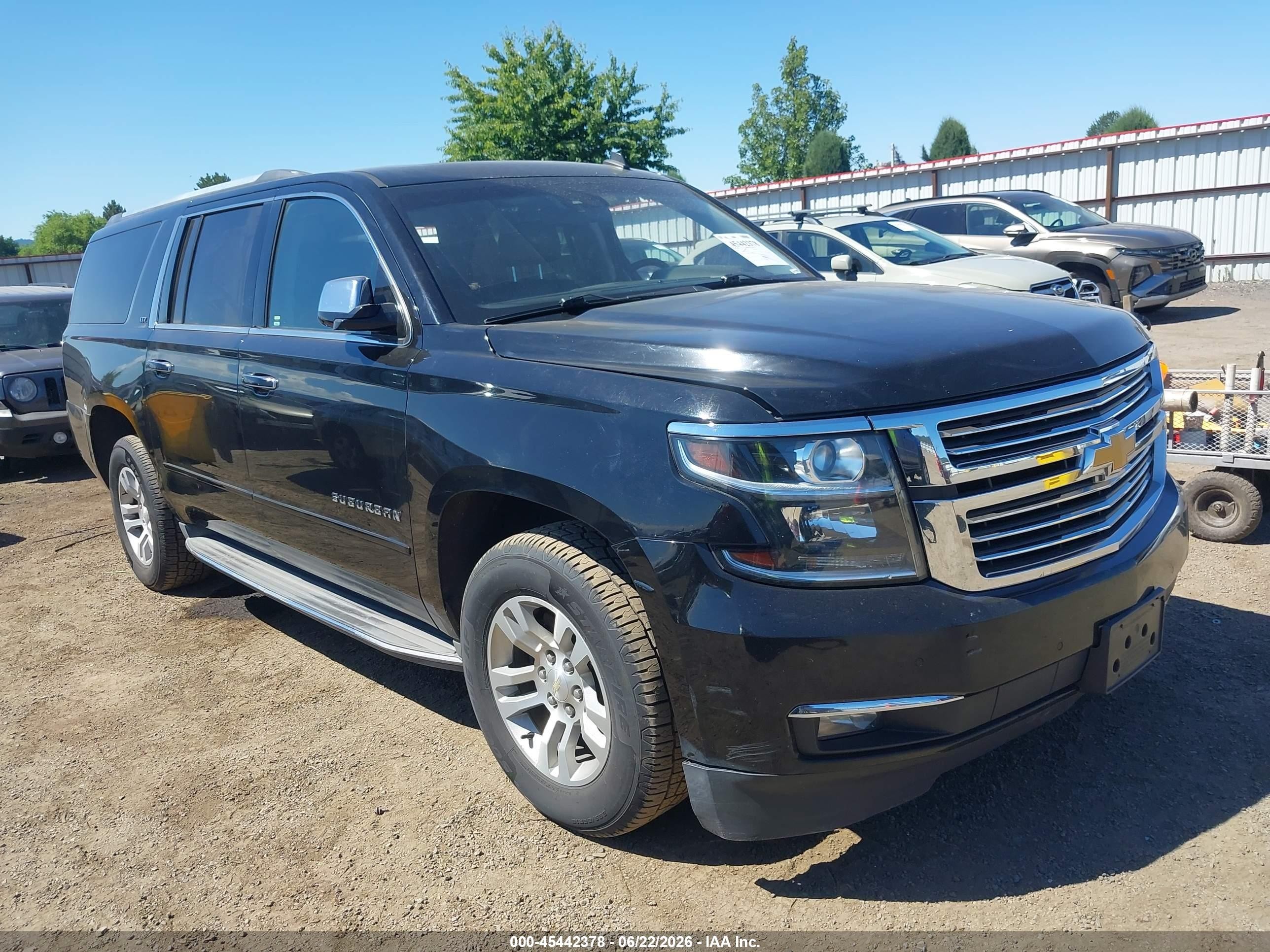 2015 Chevrolet Suburban LTZ, VIN 1GNSKKKC5FR292603 — Side