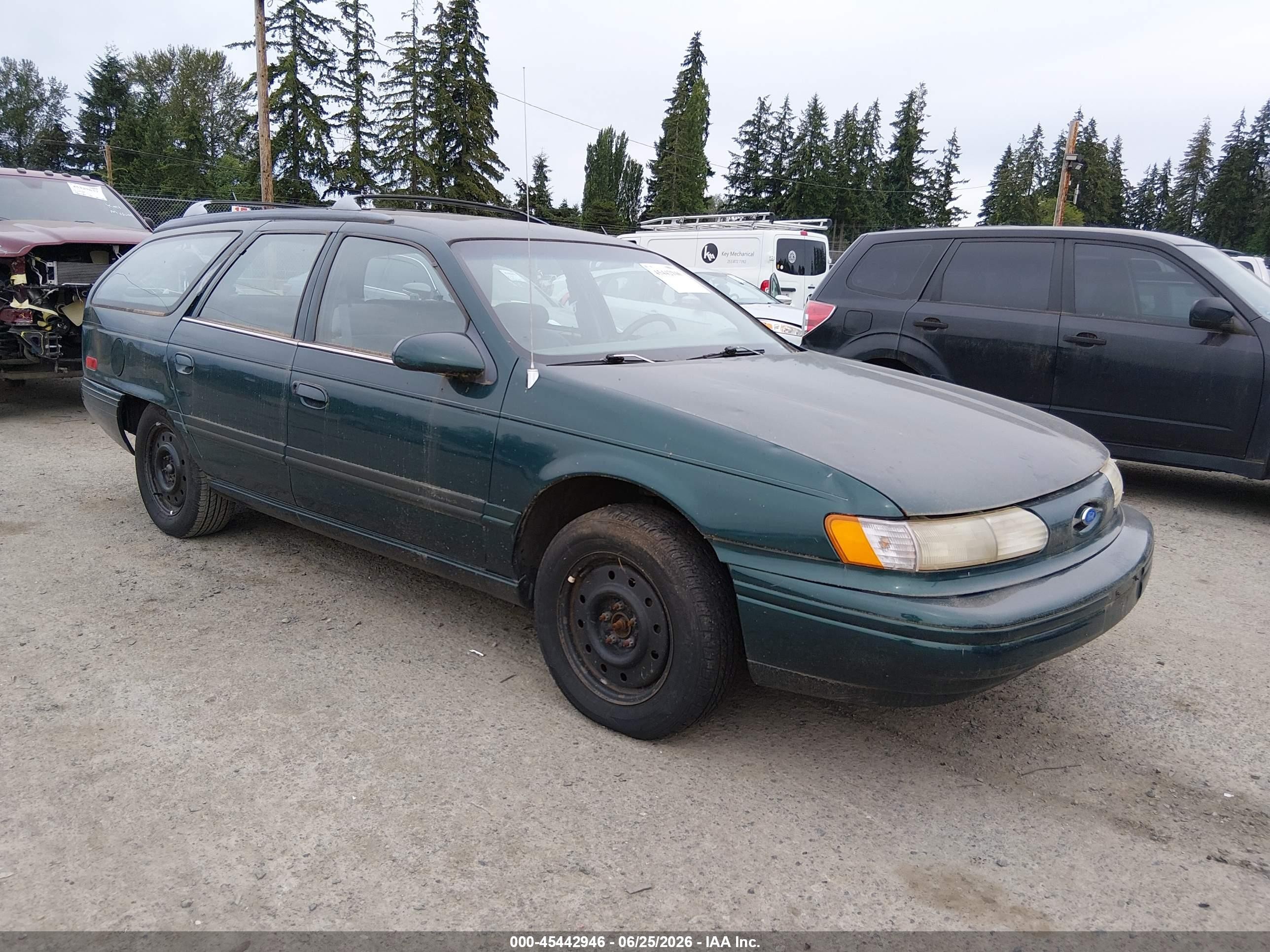 1994 Ford Taurus GL, VIN 1FALP5742RG112033 — Normal wear
