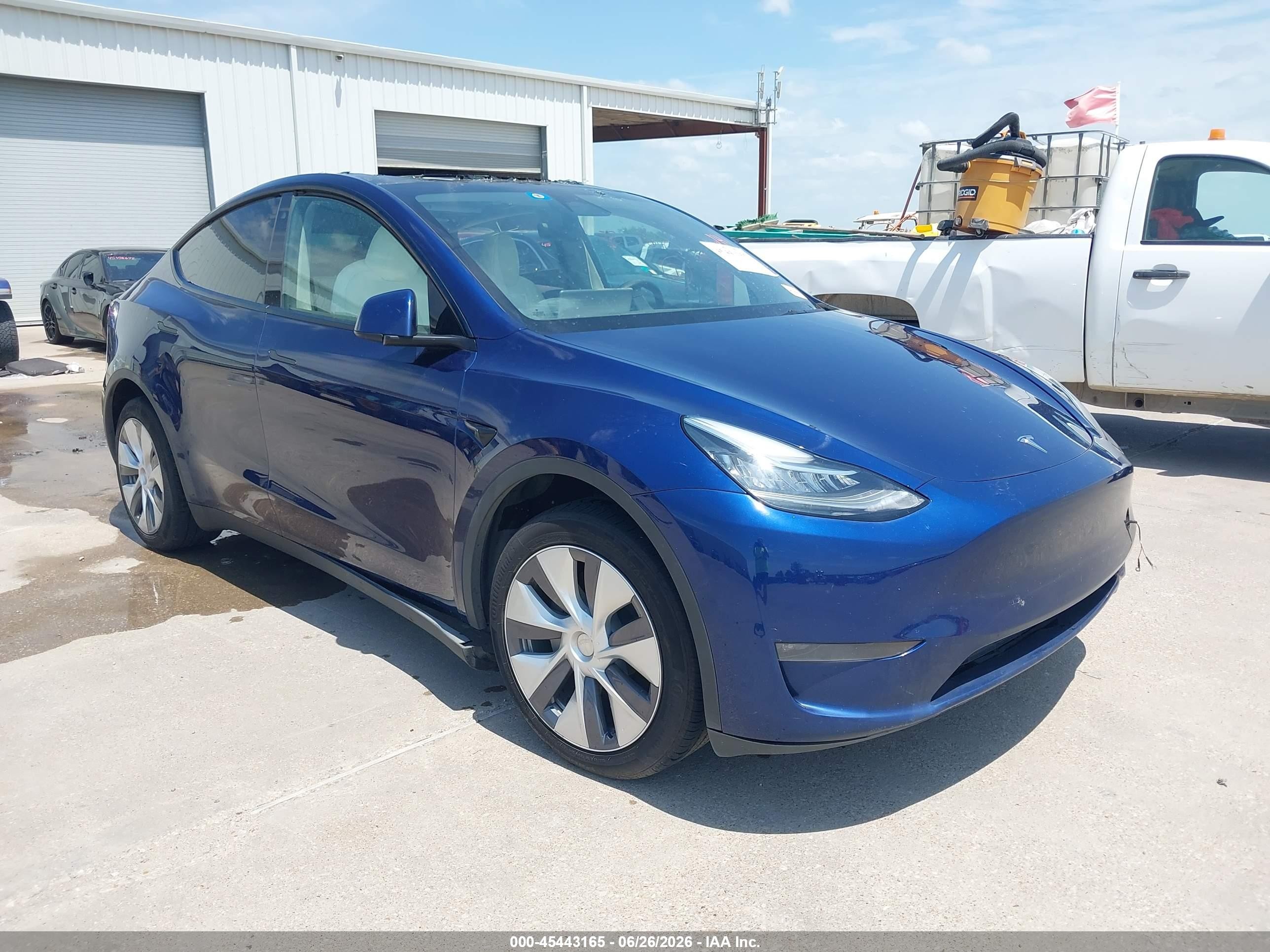 2023 Tesla Model Y Long Range, VIN 7SAYGDEE8PA077463 — Water / flood