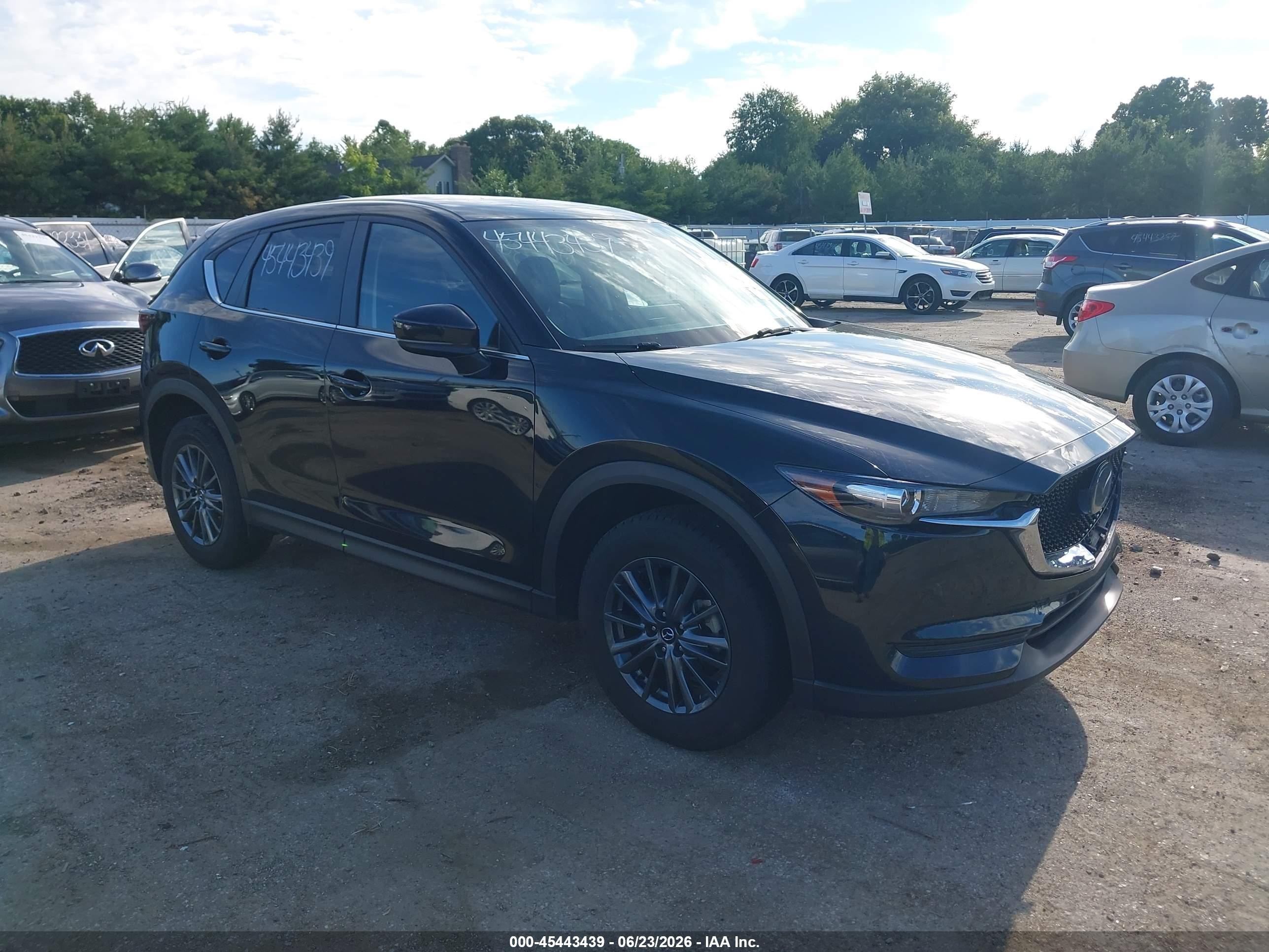 2021 Mazda CX-5 Touring, VIN JM3KFBCMXM0492809 — Rear end