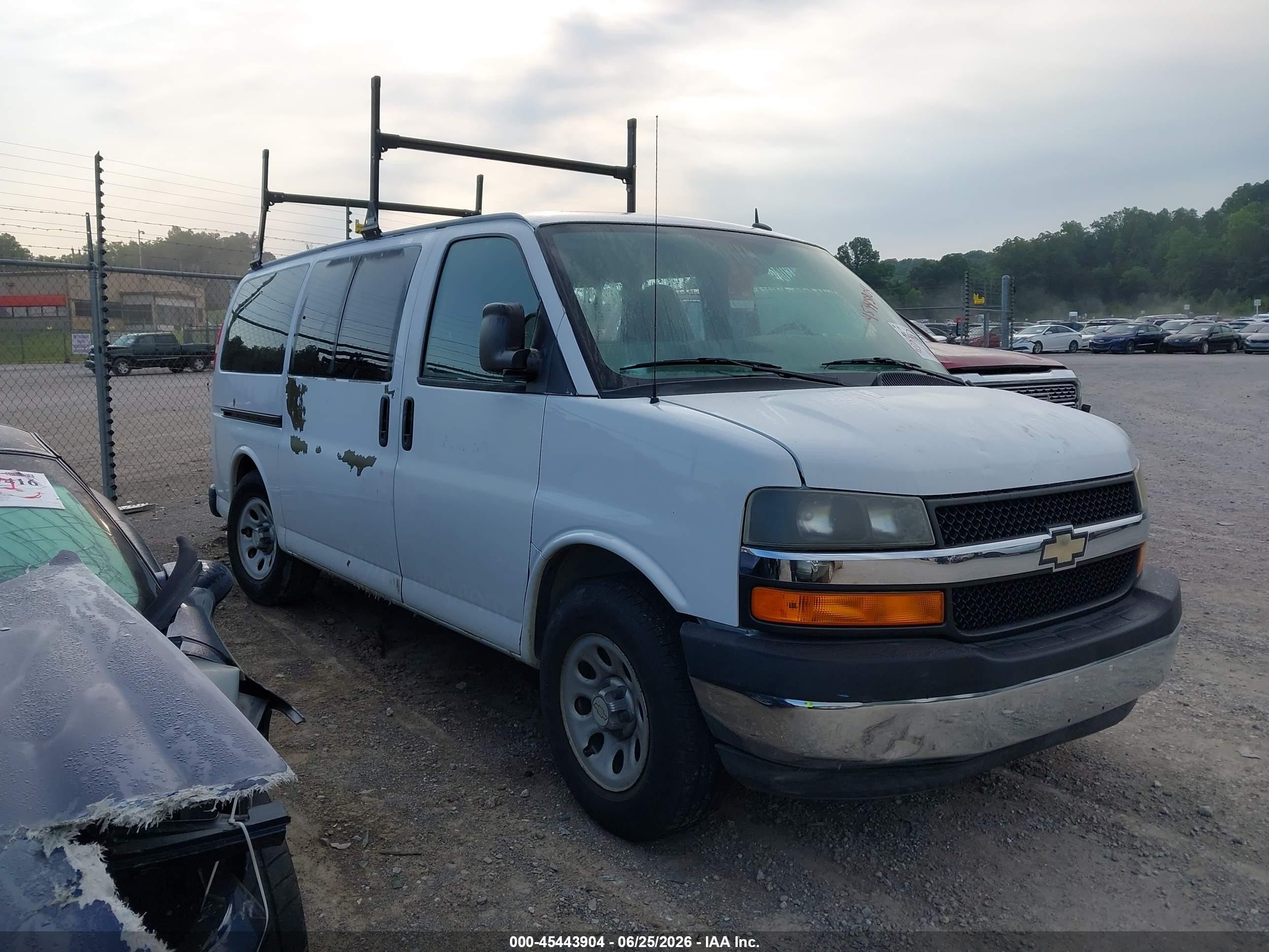 2011 Chevrolet Express Passenger 1LT, VIN 1GNSGCF43B1102493 — Side