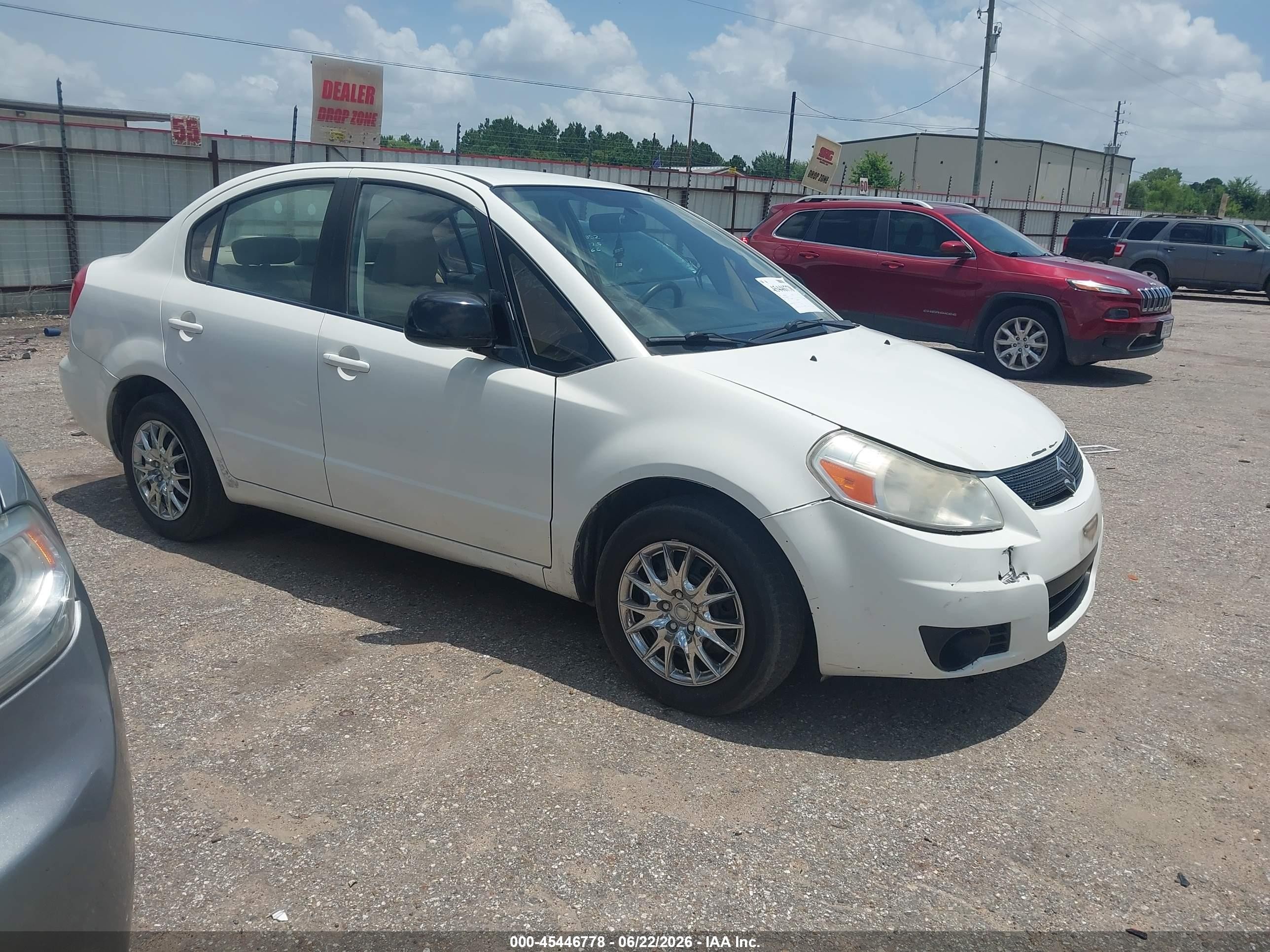 2011 Suzuki SX4 LE, VIN JS2YC5A2XB6302330 — Not stated