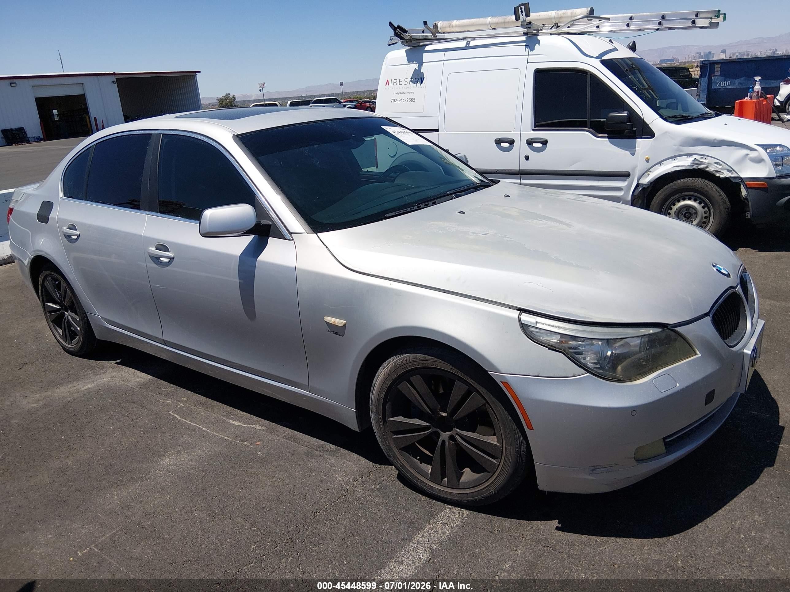 2009 BMW 5 Series 528i xDrive, VIN WBANV135X9C151103 — Normal wear