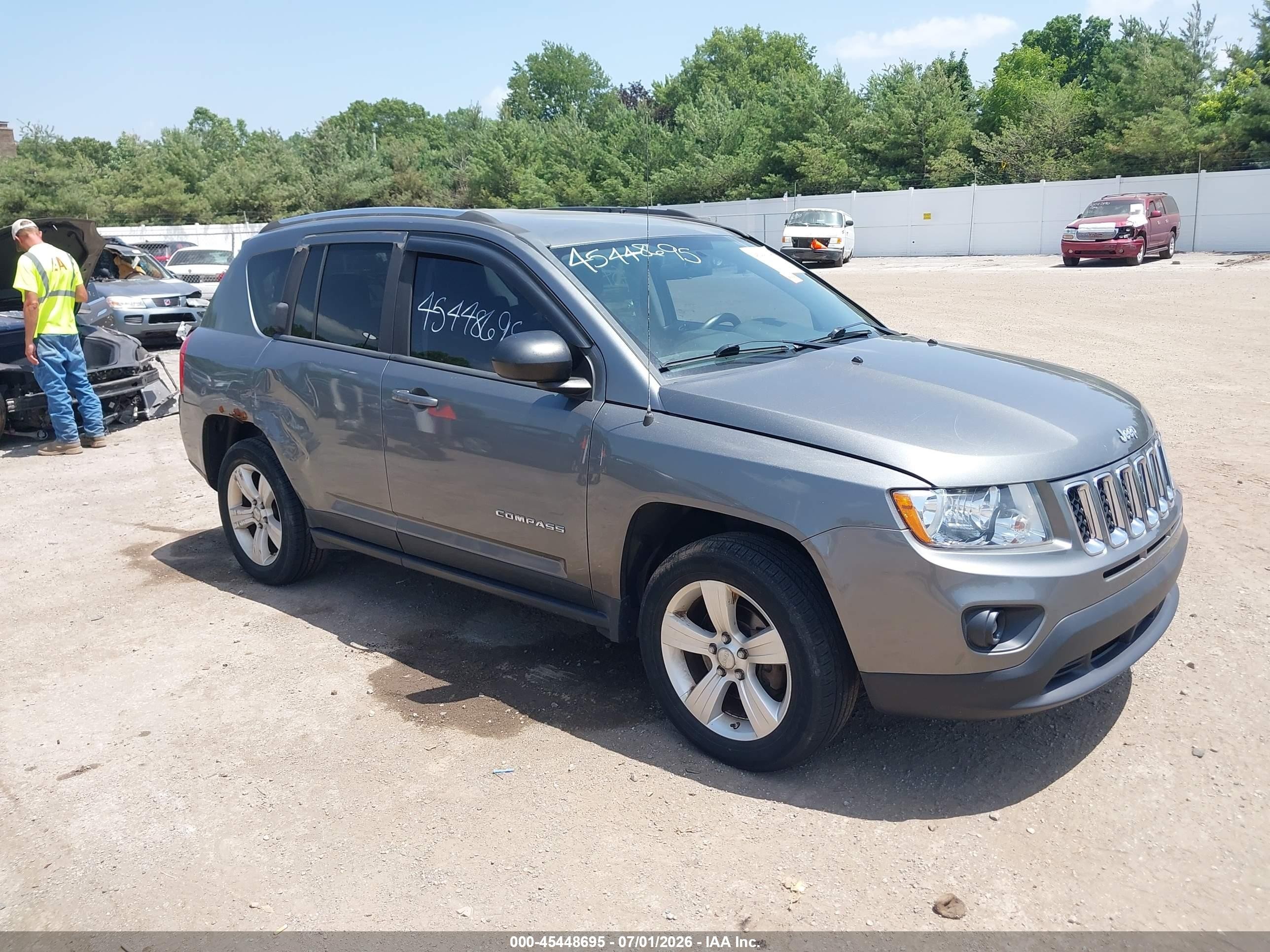 2012 Jeep Compass Sport, VIN 1C4NJDBB0CD576192 — Side