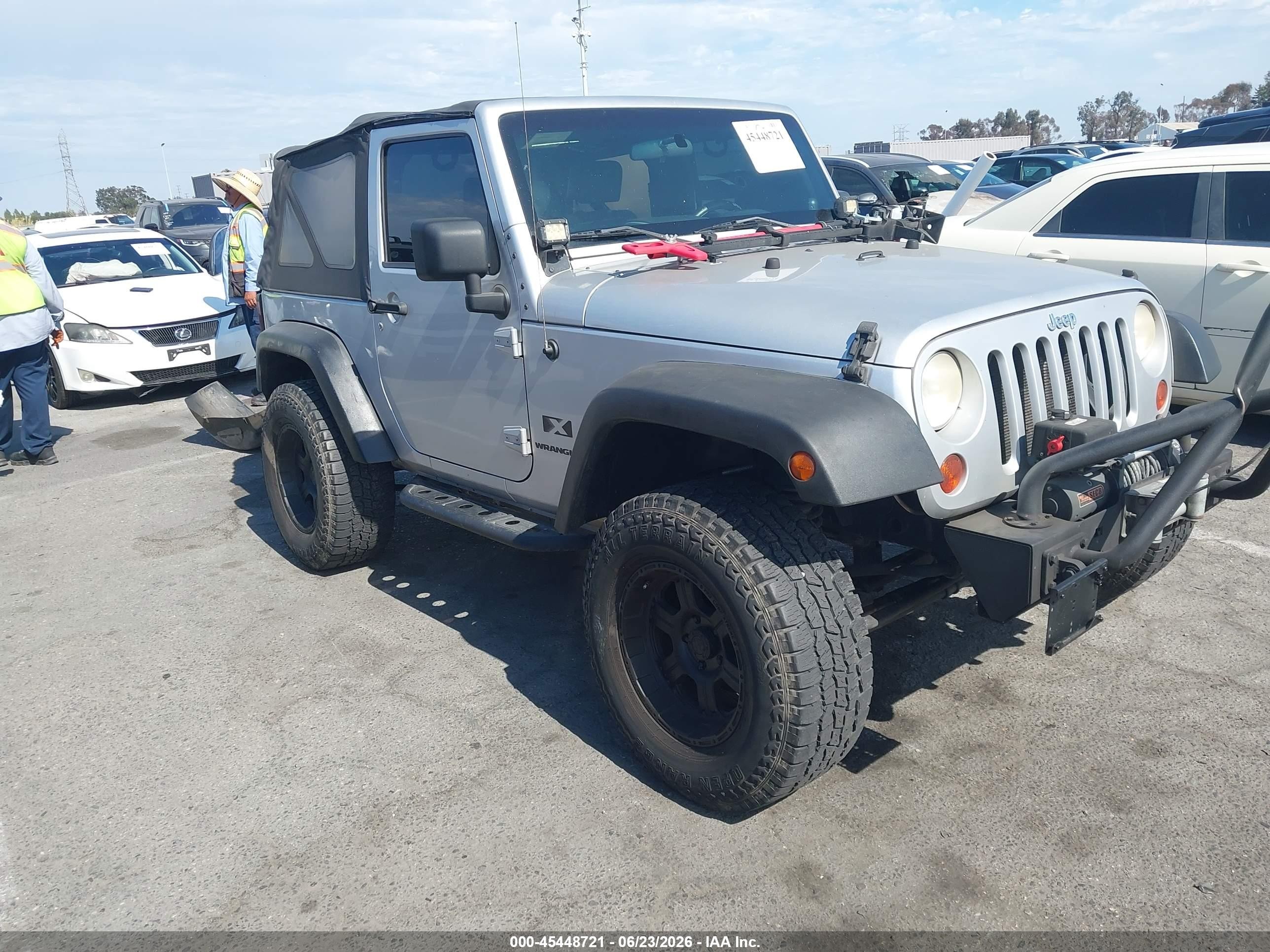 2009 Jeep Wrangler X, VIN 1J4FA24119L790663 — Rear end