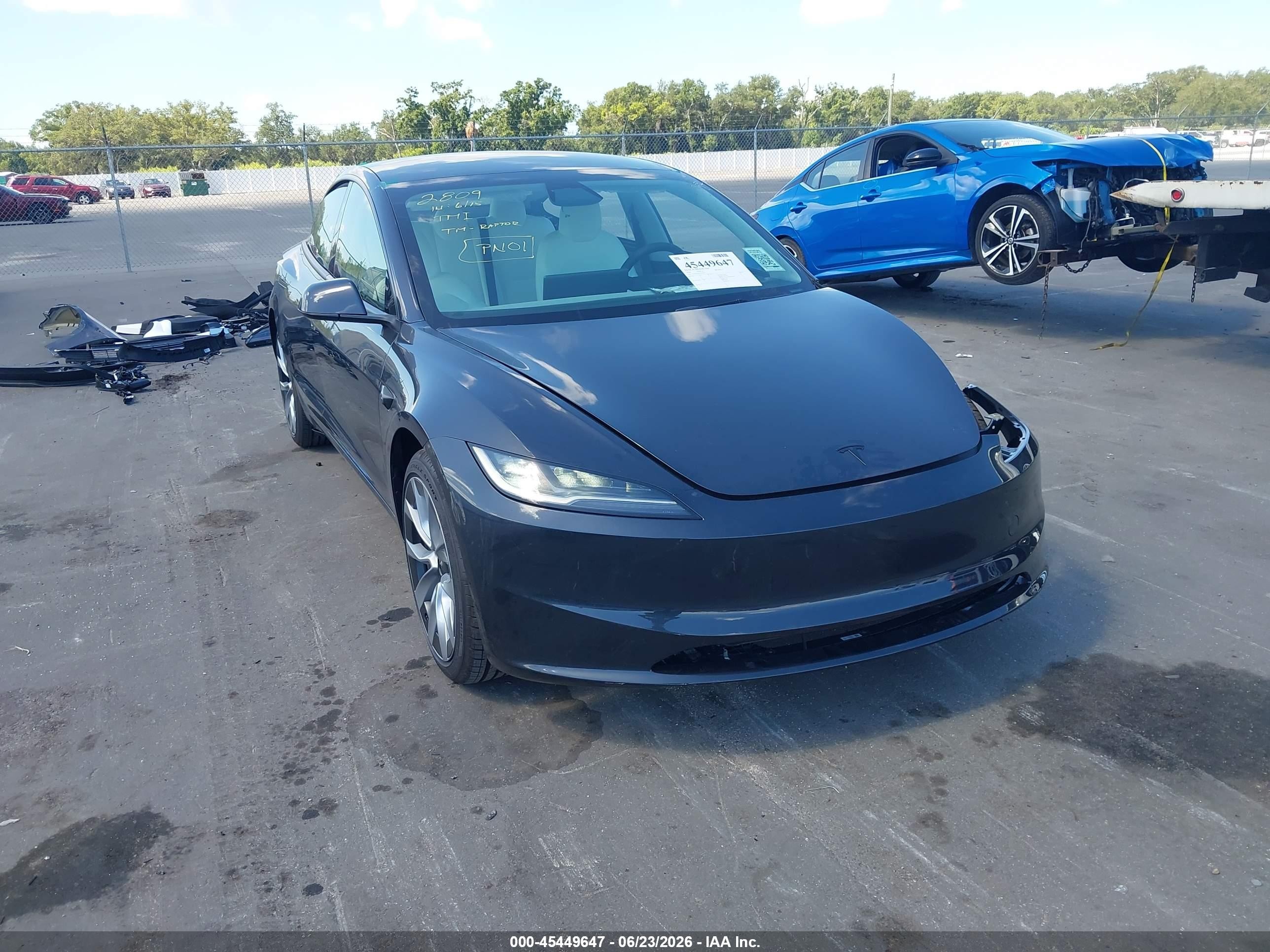 2026 Tesla Model 3 Premium, VIN 5YJ3E1EA9TF160423 — Front end