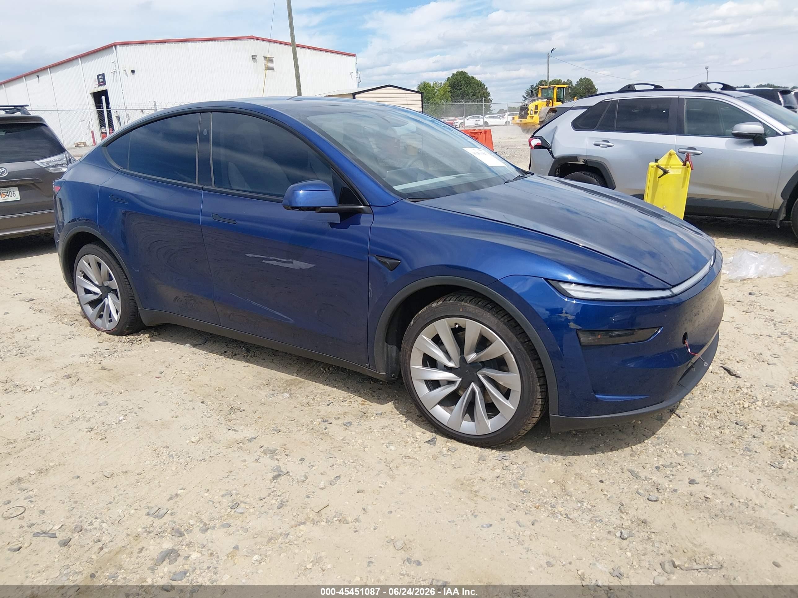 2026 Tesla Model Y Long Range Launch Series, VIN 7SAYGDEE2TA395170 — Side