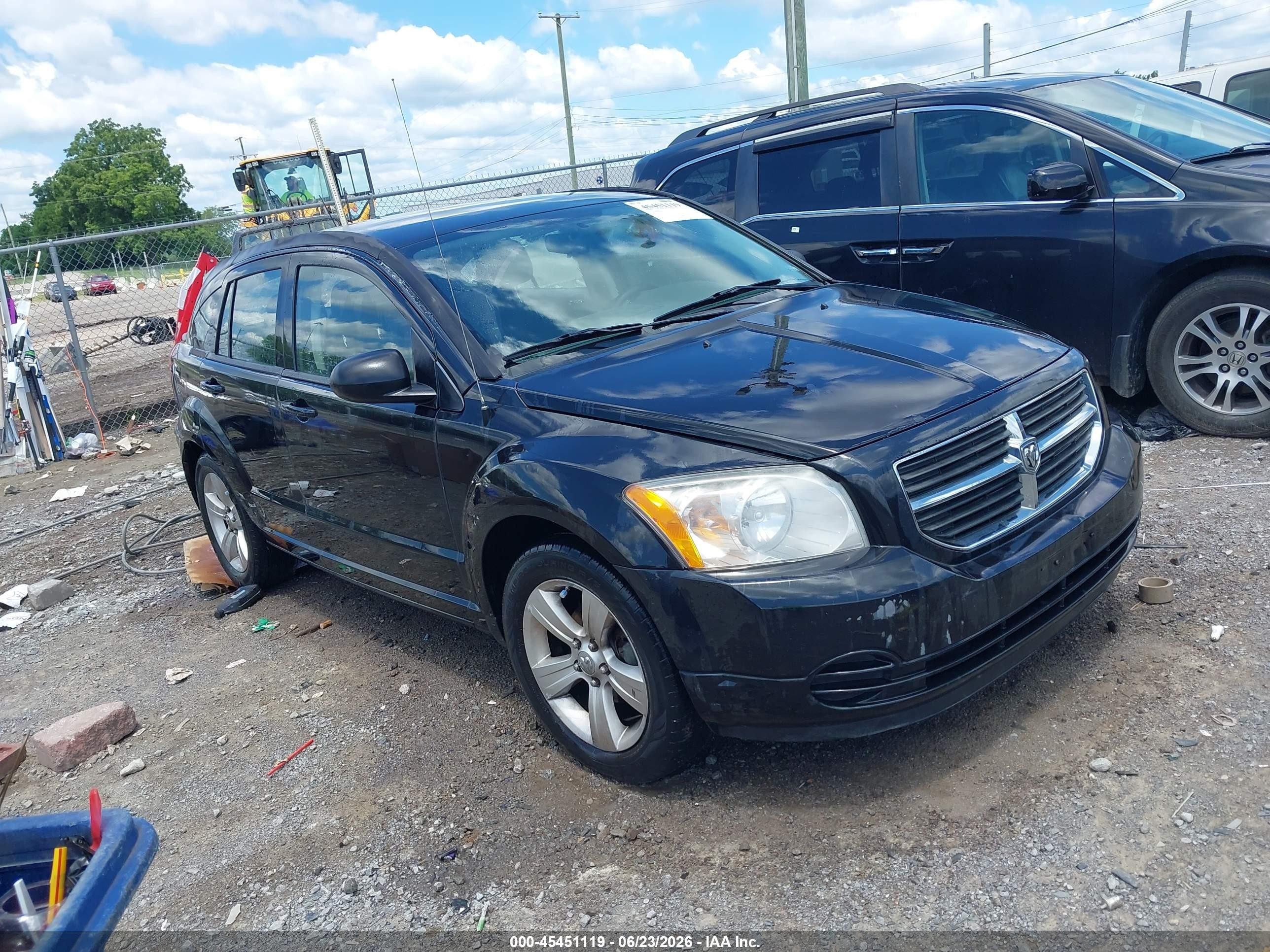 2010 Dodge Caliber SXT, VIN 1B3CB4HA5AD663314 — Normal wear