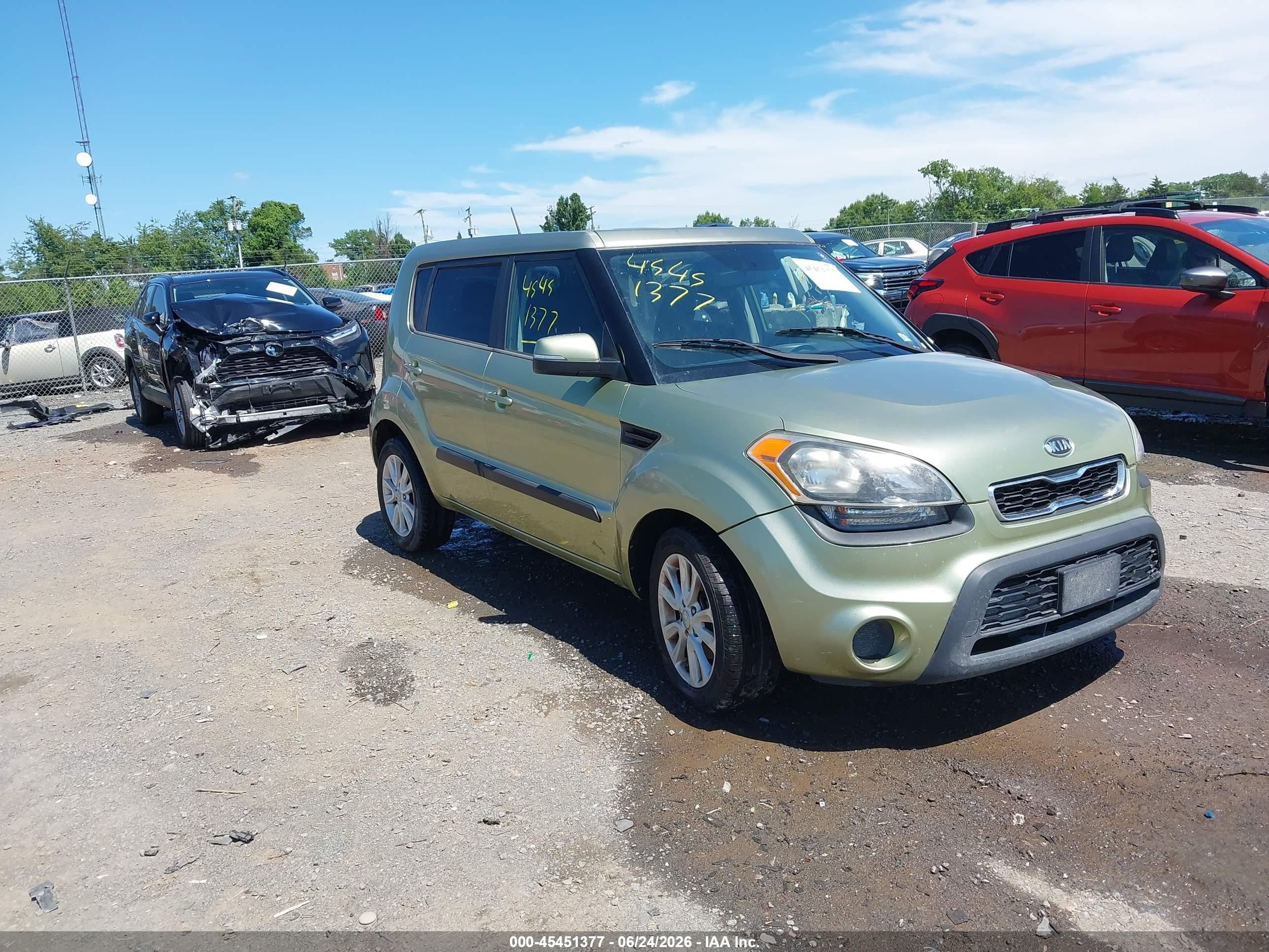2012 Kia Soul +, VIN KNDJT2A64C7378330 — Side