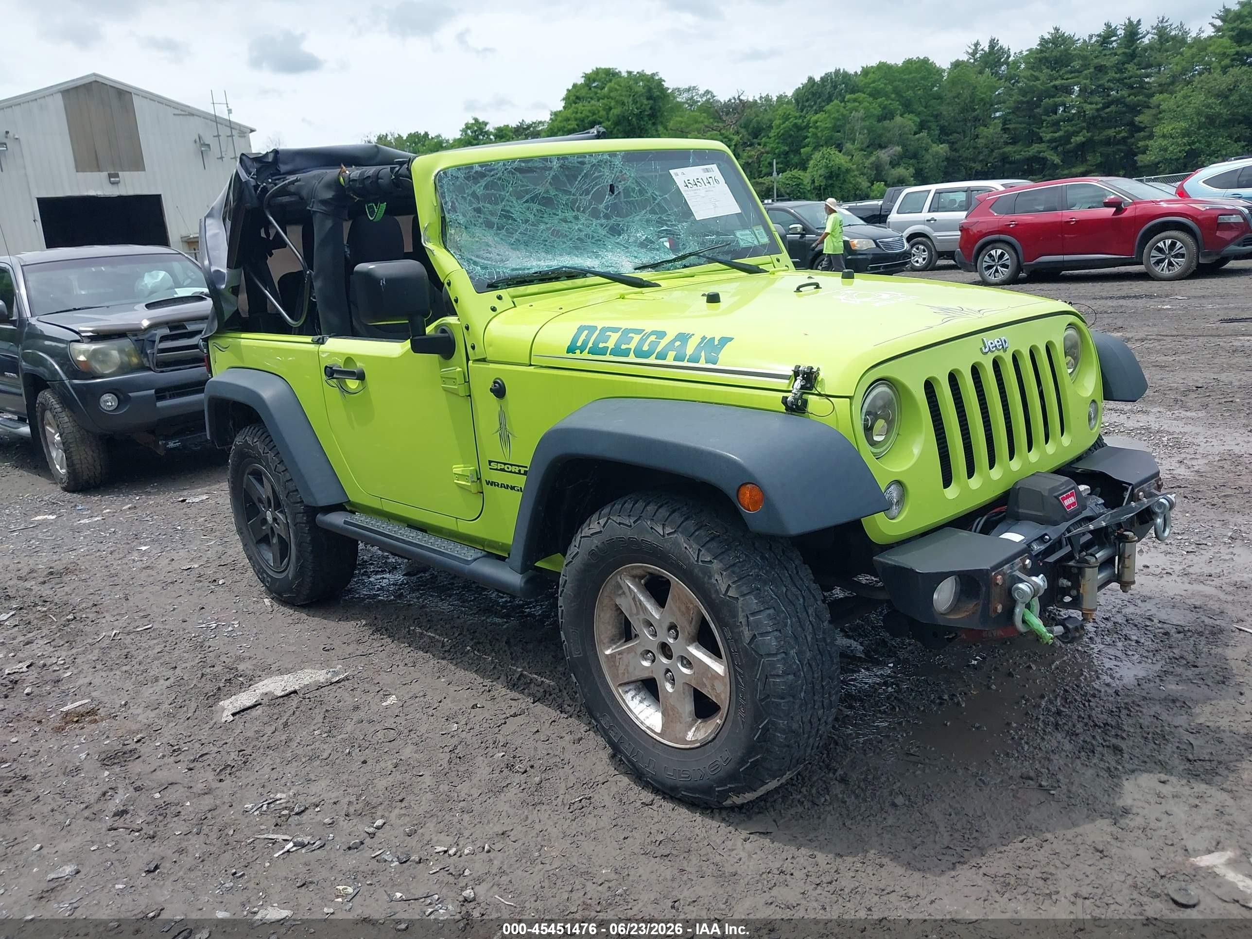 2016 Jeep Wrangler Willys Wheeler, VIN 1C4AJWAG9GL325481 — Side