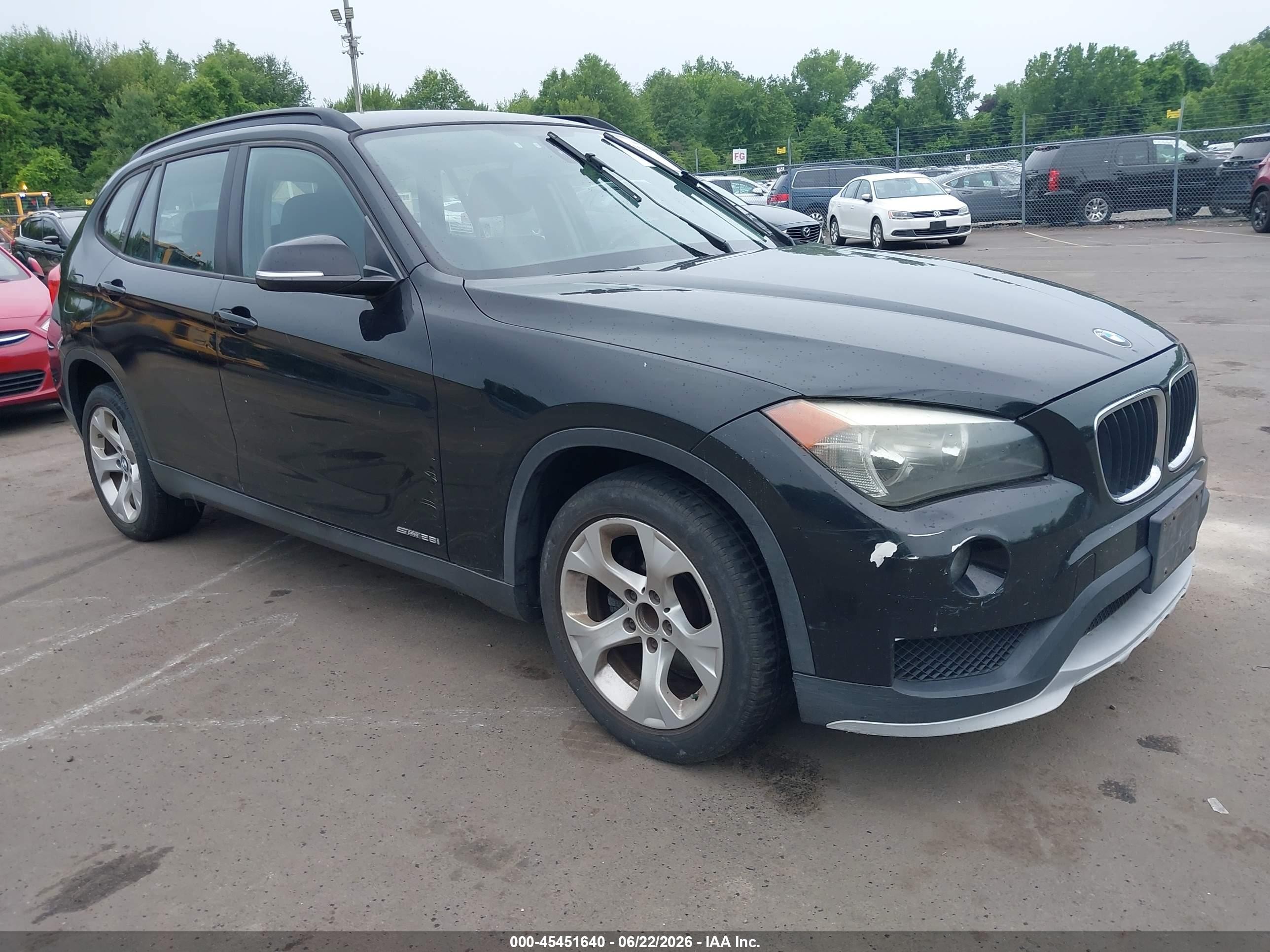 2015 BMW X1 sDrive28i, VIN WBAVM1C54FVW58016 — Normal wear
