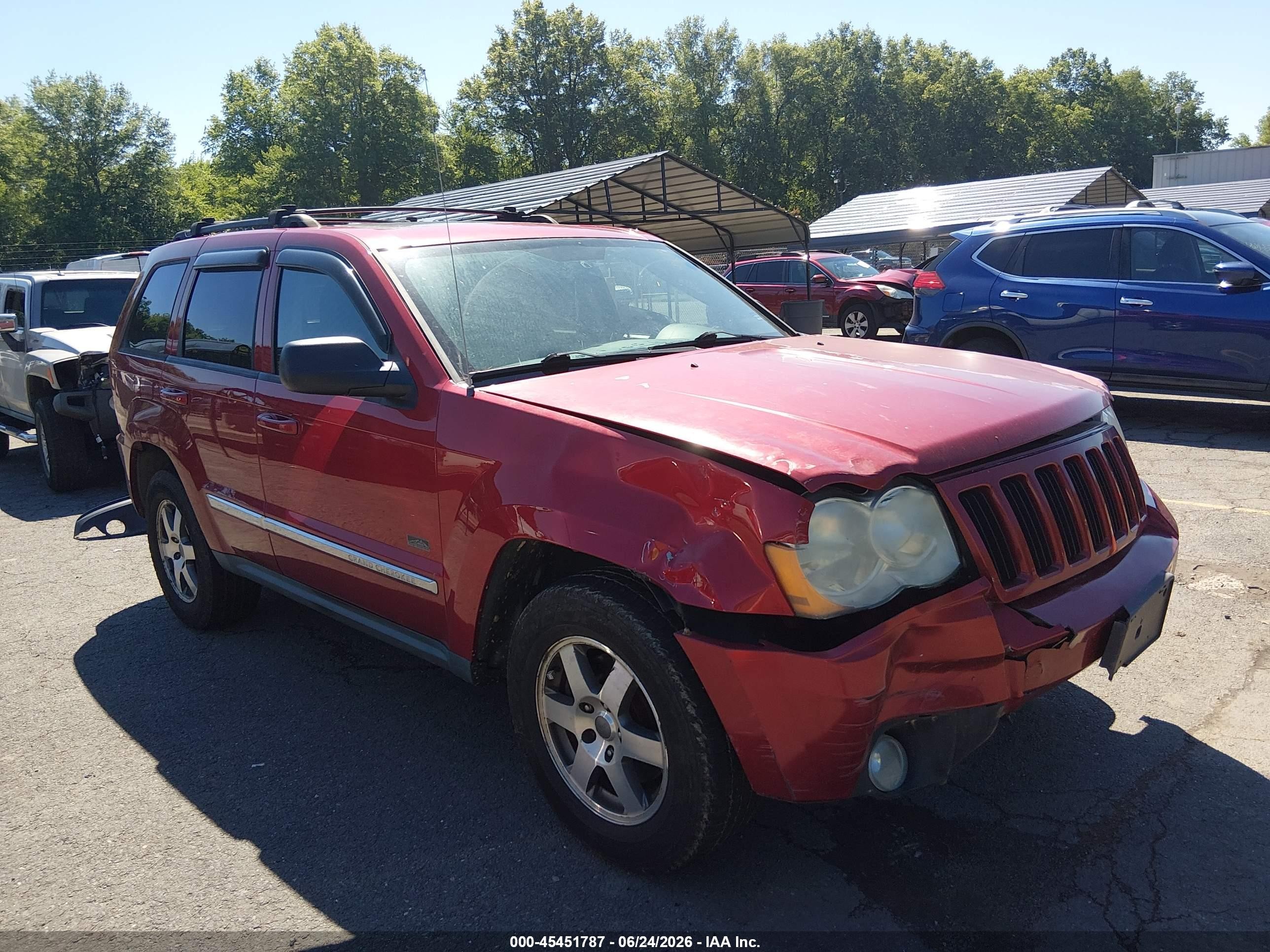 2009 Jeep Grand Cherokee Laredo, VIN 1J8GR48KX9C543331 — Front end