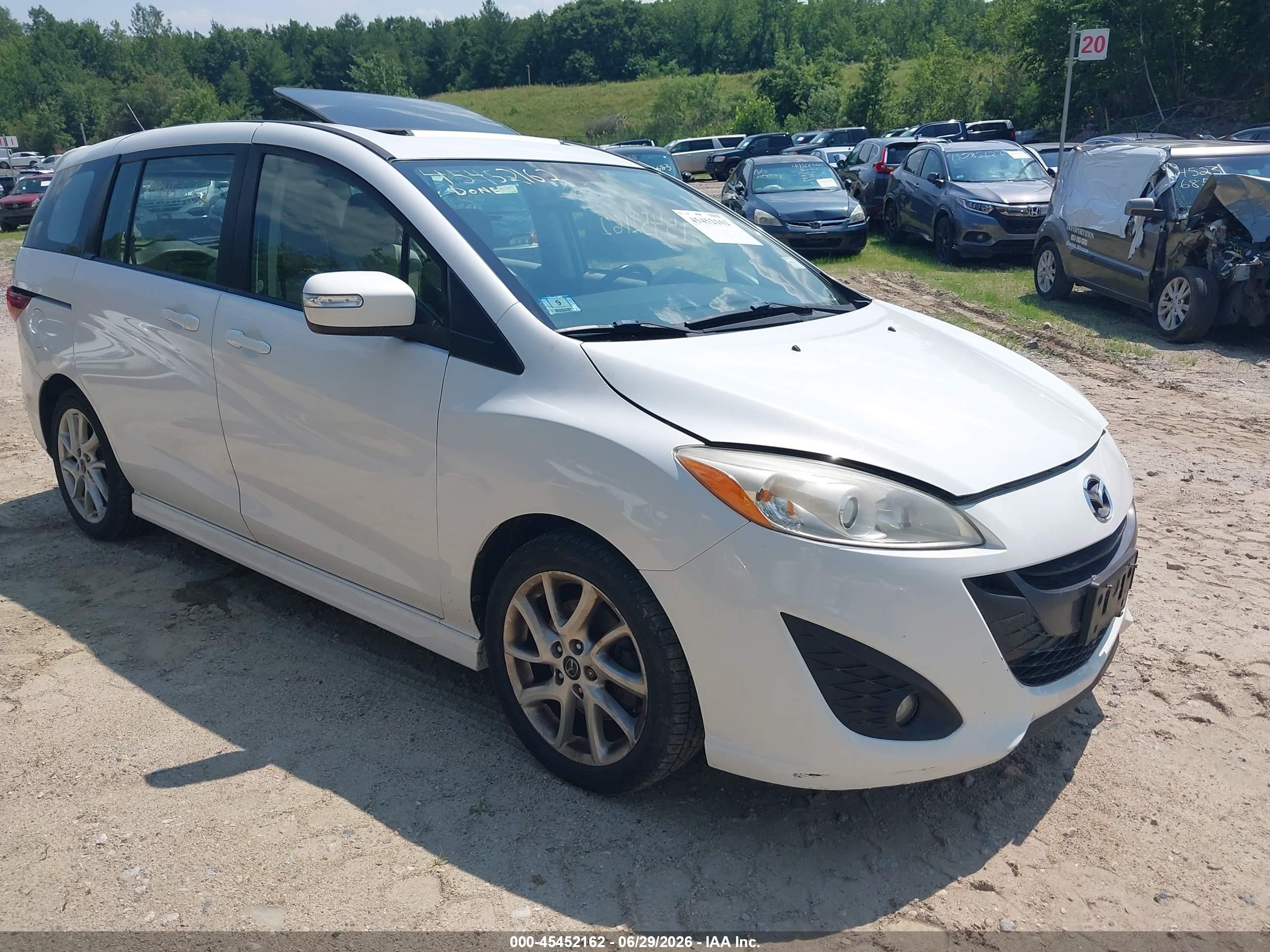 2014 Mazda 5 Touring, VIN JM1CW2CL6E0164910 — Side