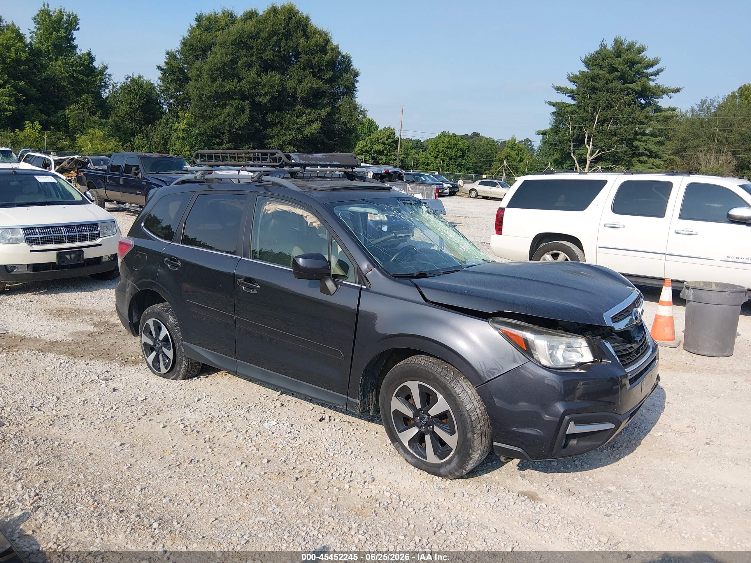 2017 Subaru Forester Limited, VIN JF2SJAJC7HH572296 — Бок