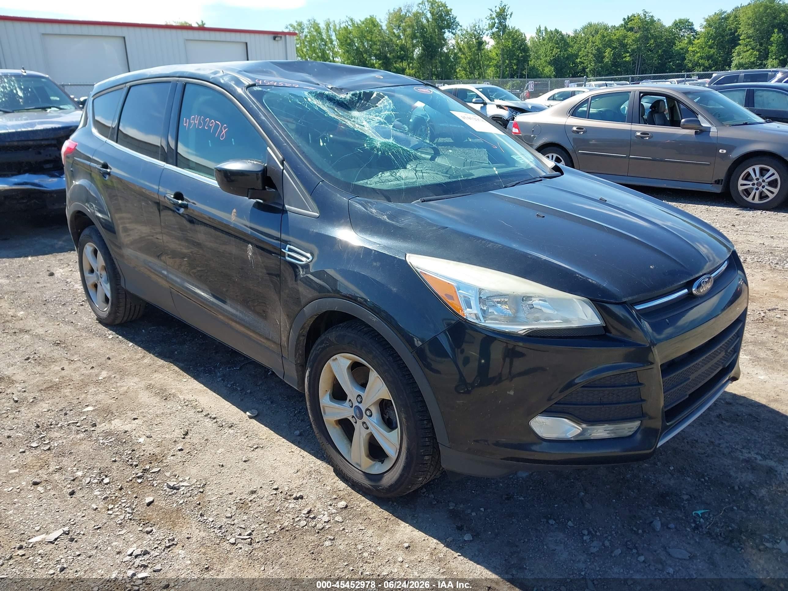 2014 Ford Escape SE, VIN 1FMCU9G90EUA66053 — Storm