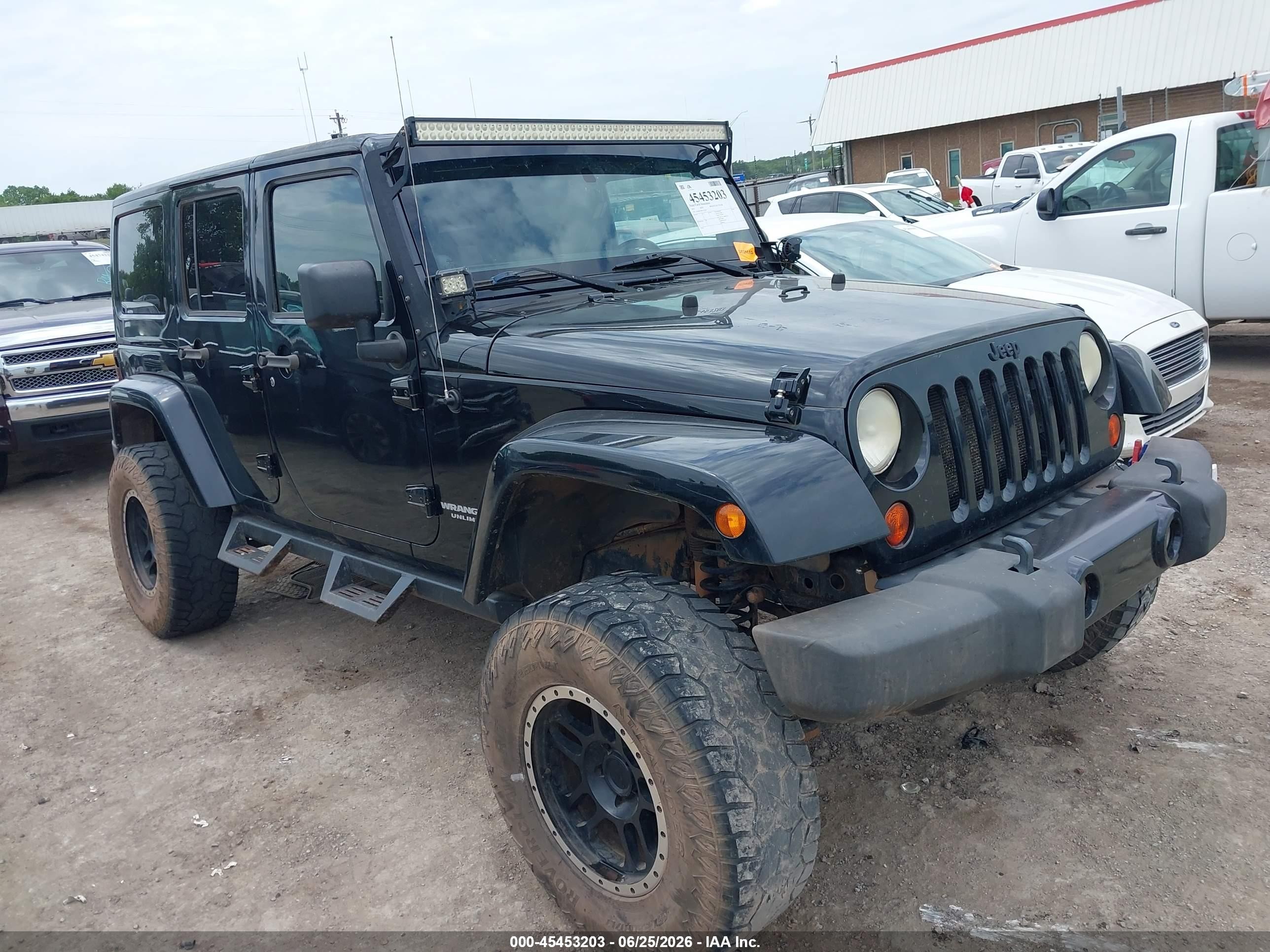 2012 Jeep Wrangler Unlimited Sahara, VIN 1C4BJWEG8CL271387 — Rear end