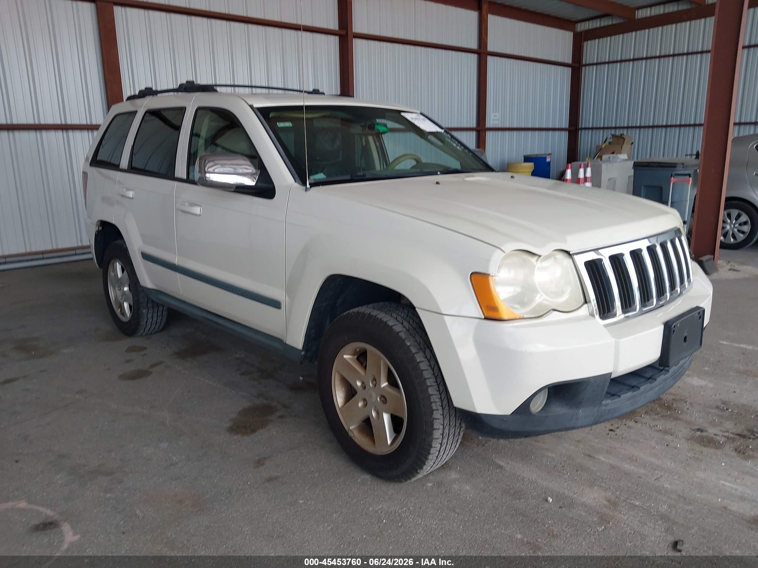 2009 Jeep Grand Cherokee Laredo, VIN 1J8GR48K69C539440 — Normal wear