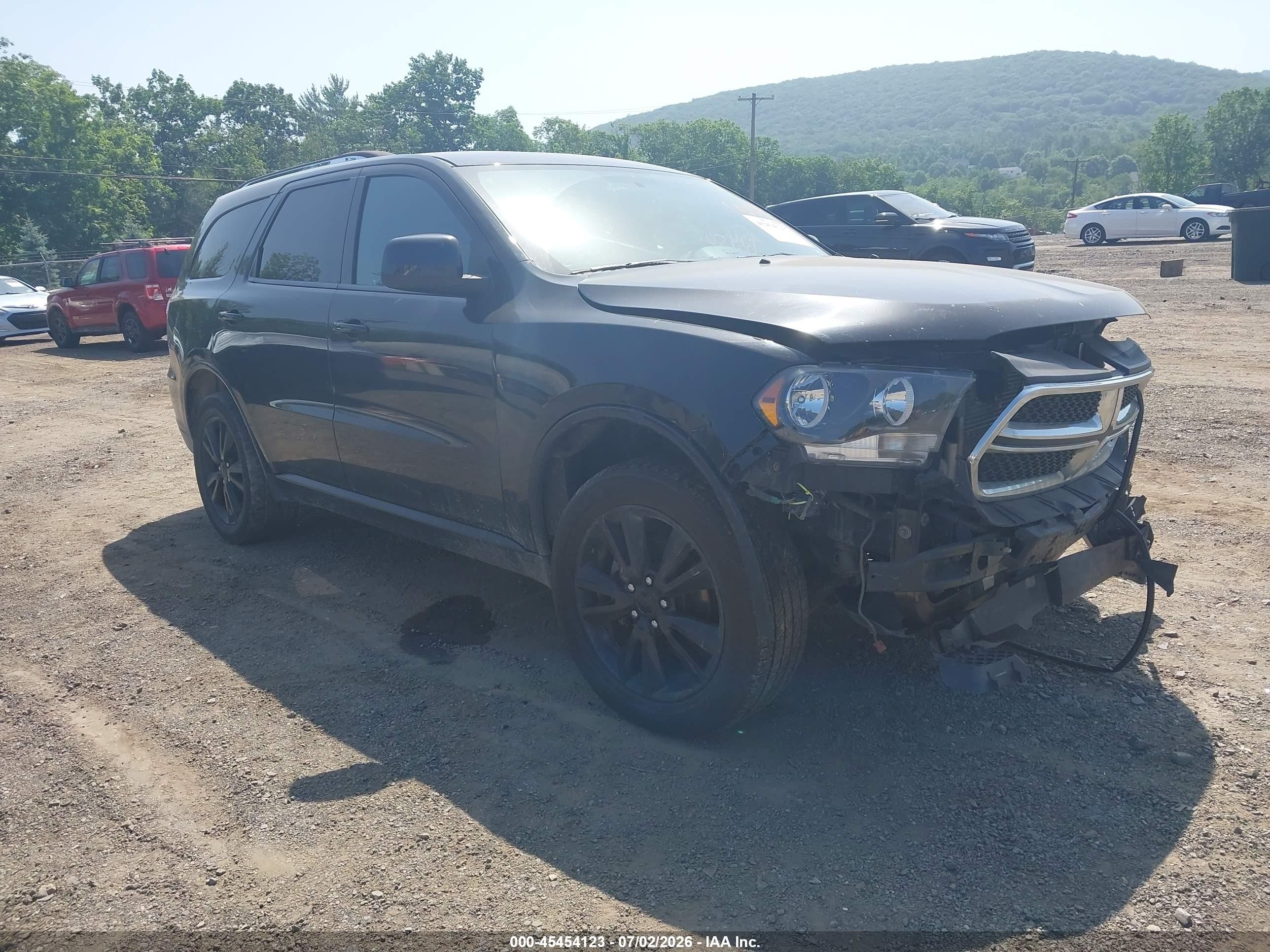 2013 Dodge Durango SXT, VIN 1C4RDJAG8DC682479 — Front end