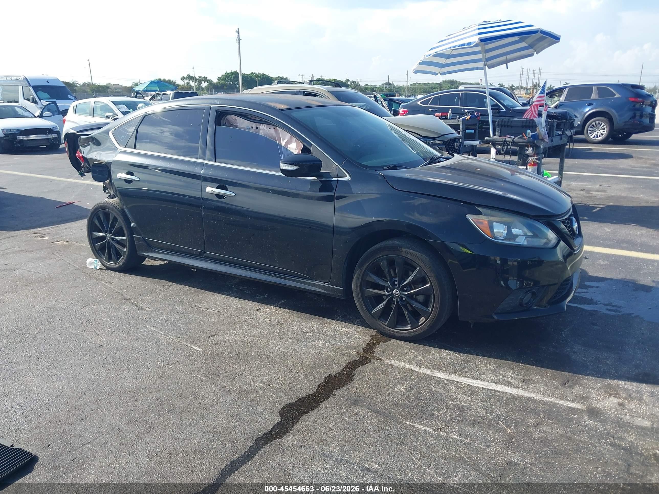 2018 Nissan Sentra S, VIN 3N1AB7AP0JY252957 — Зад