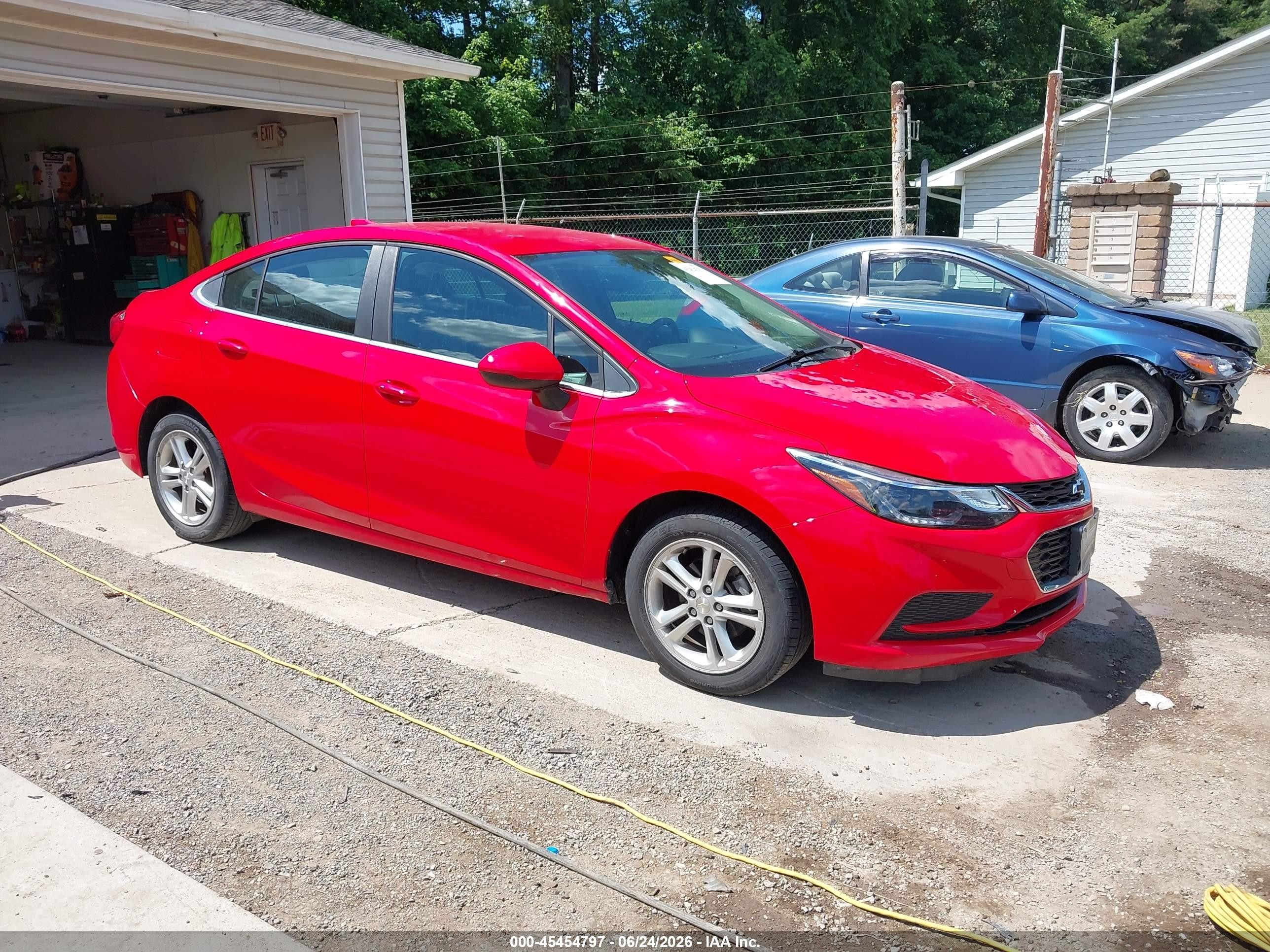 2018 Chevrolet Cruze LT, VIN 1G1BE5SM6J7233910 — Hail