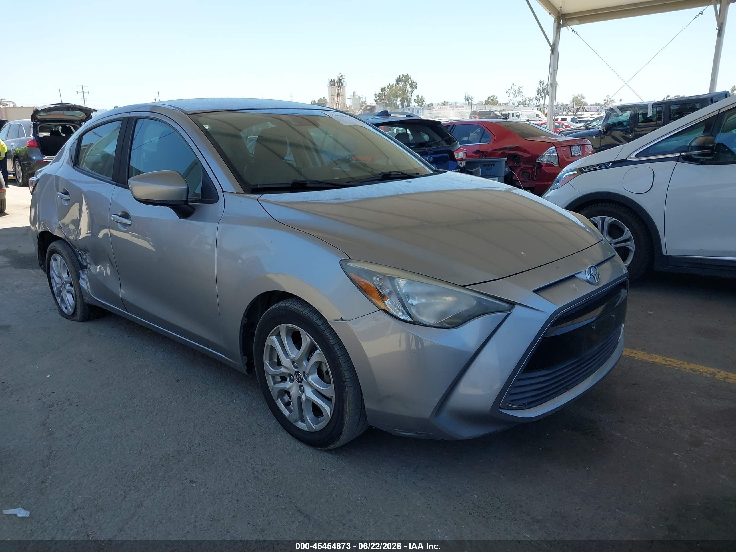 2016 Scion iA, VIN 3MYDLBZV9GY143601 — Side