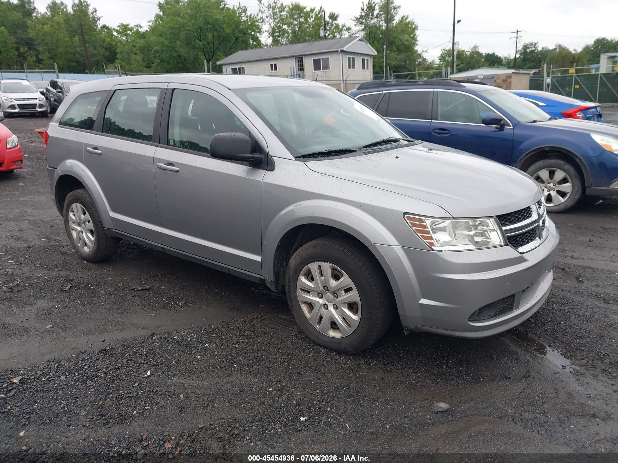 2015 Dodge Journey American Value, VIN 3C4PDCAB9FT591672 — Зад