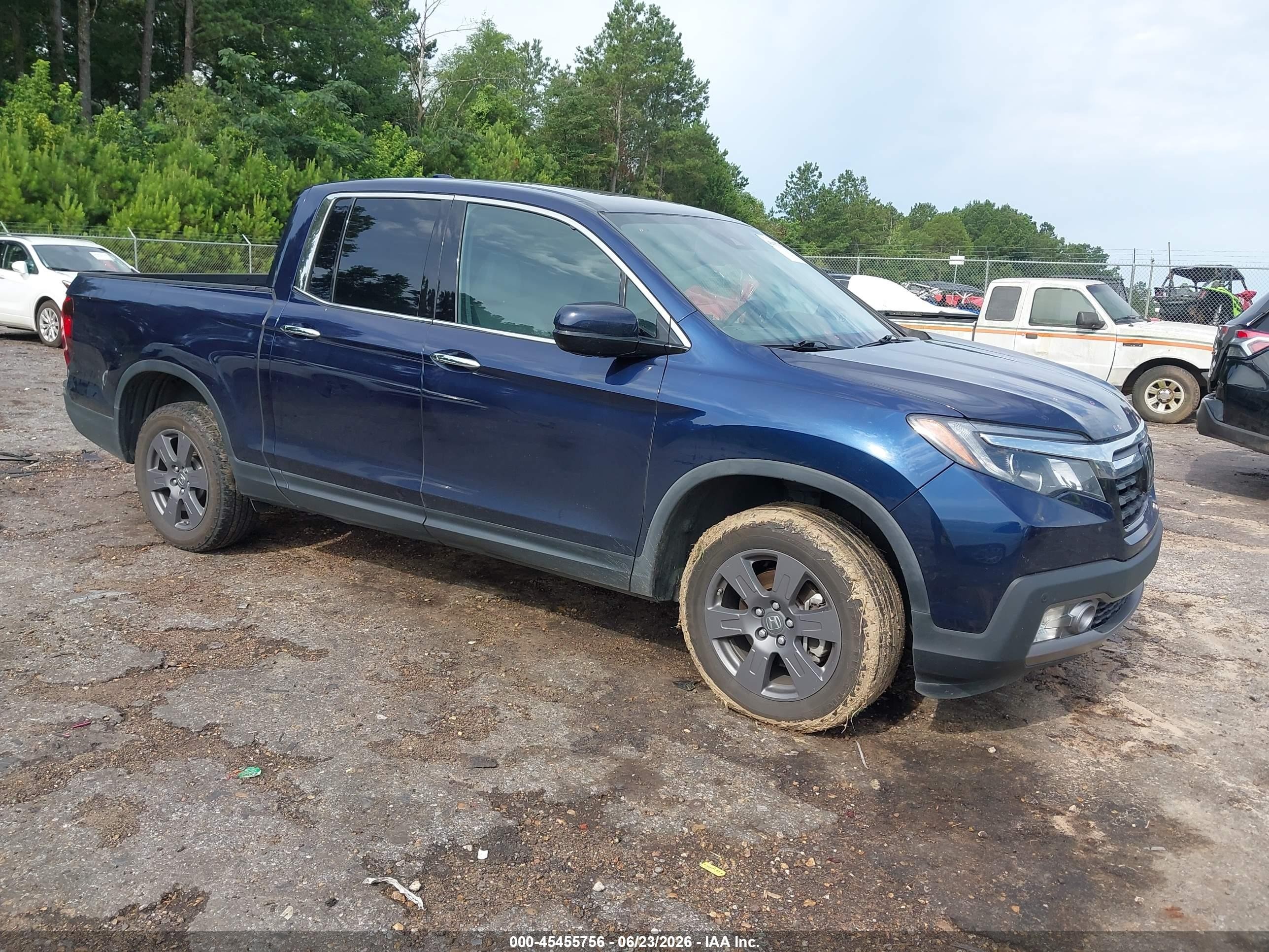 2020 Honda Ridgeline RTL-E, VIN 5FPYK3F7XLB000653 — Side