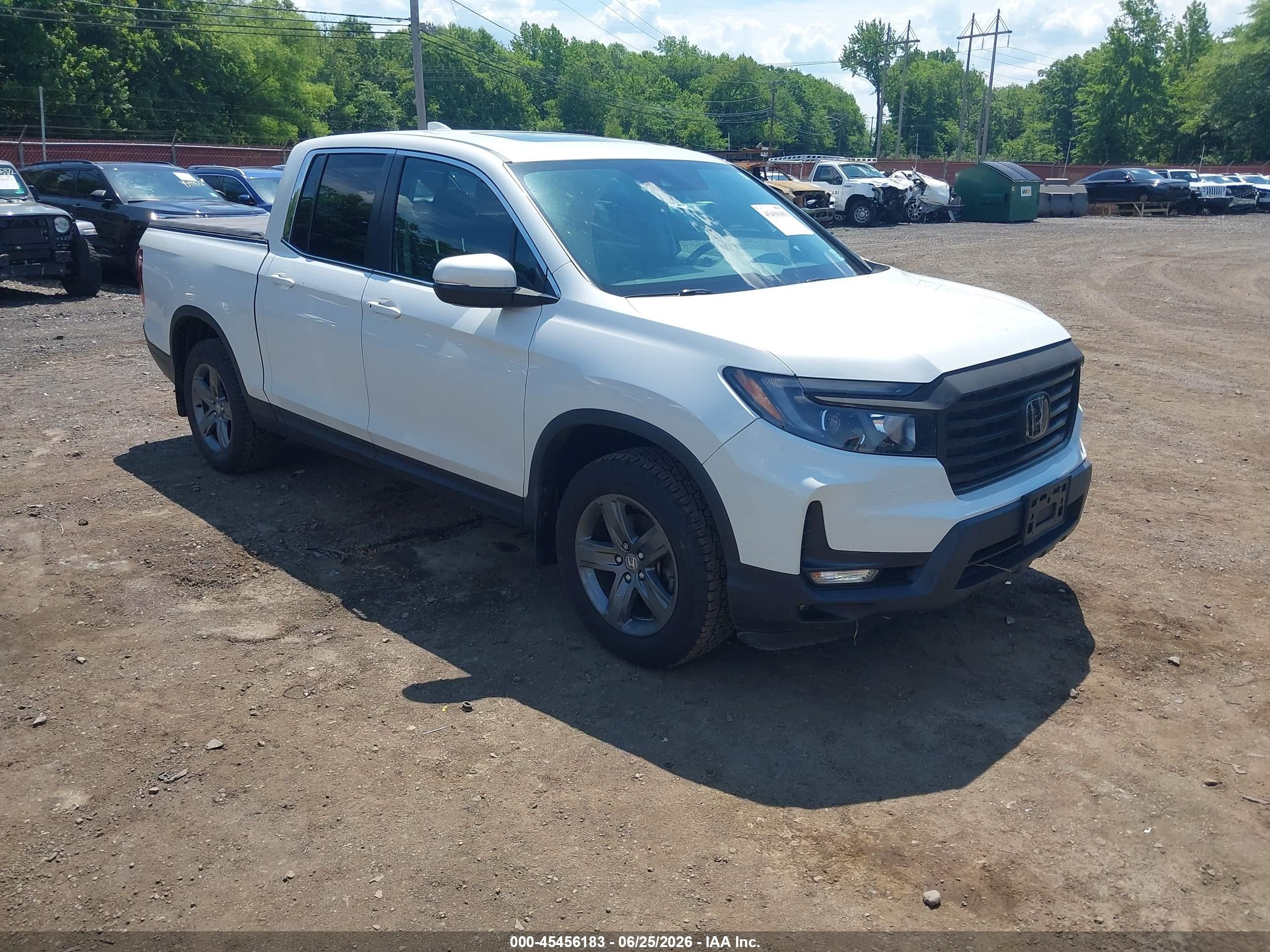 2021 Honda Ridgeline RTL, VIN 5FPYK3F50MB022645 — Side