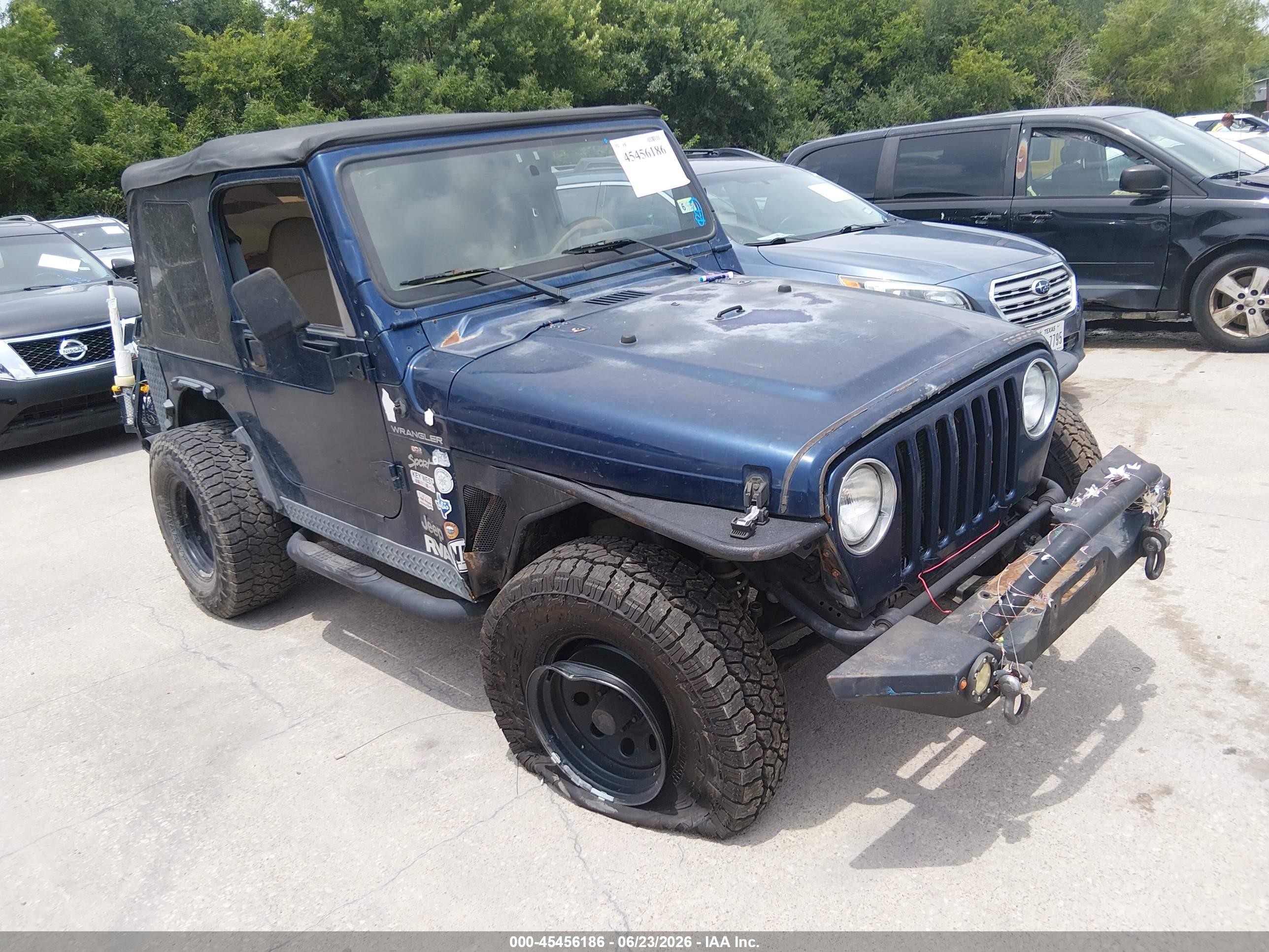 2002 Jeep Wrangler Sport, VIN 1J4FA49S92P756448 — Normal wear