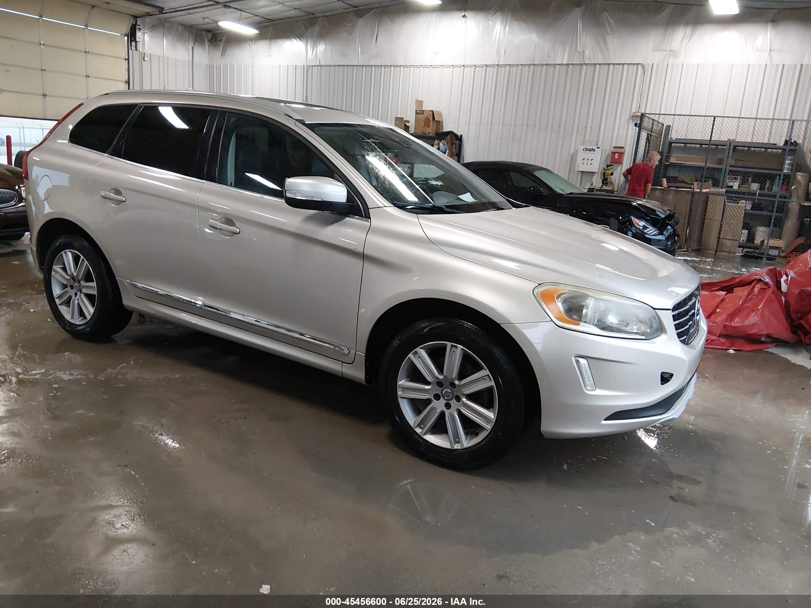 2017 Volvo XC60 Inscription, VIN YV440MDU8H2008737 — Hail